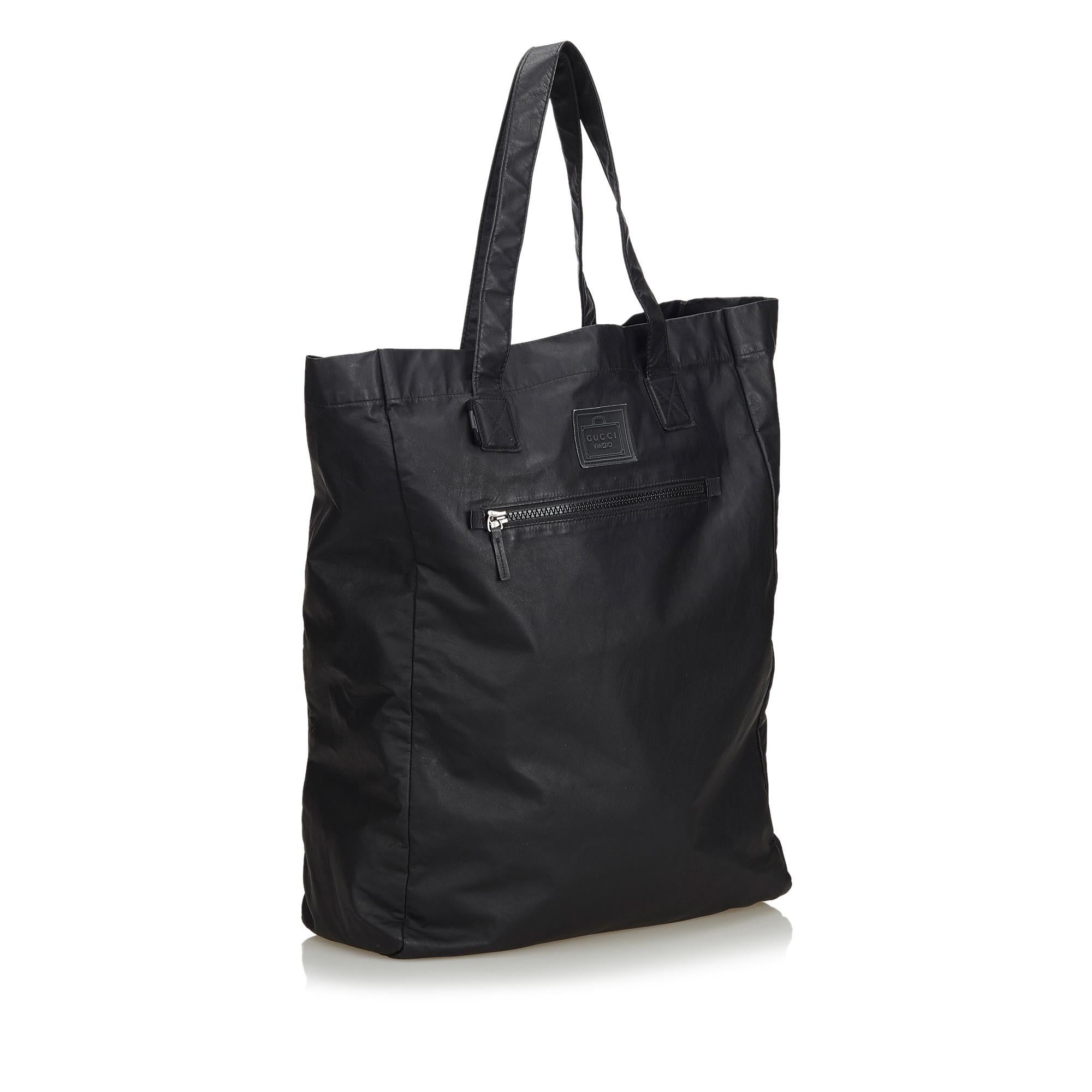 The Viaggio tote bag features a leather body, a front exterior zip pocket, flat leather handles, and an open top. It carries as B+ condition rating.

Inclusions: 
This item does not come with inclusions.

Dimensions:
Length: 42.00 cm
Width: 32.00
