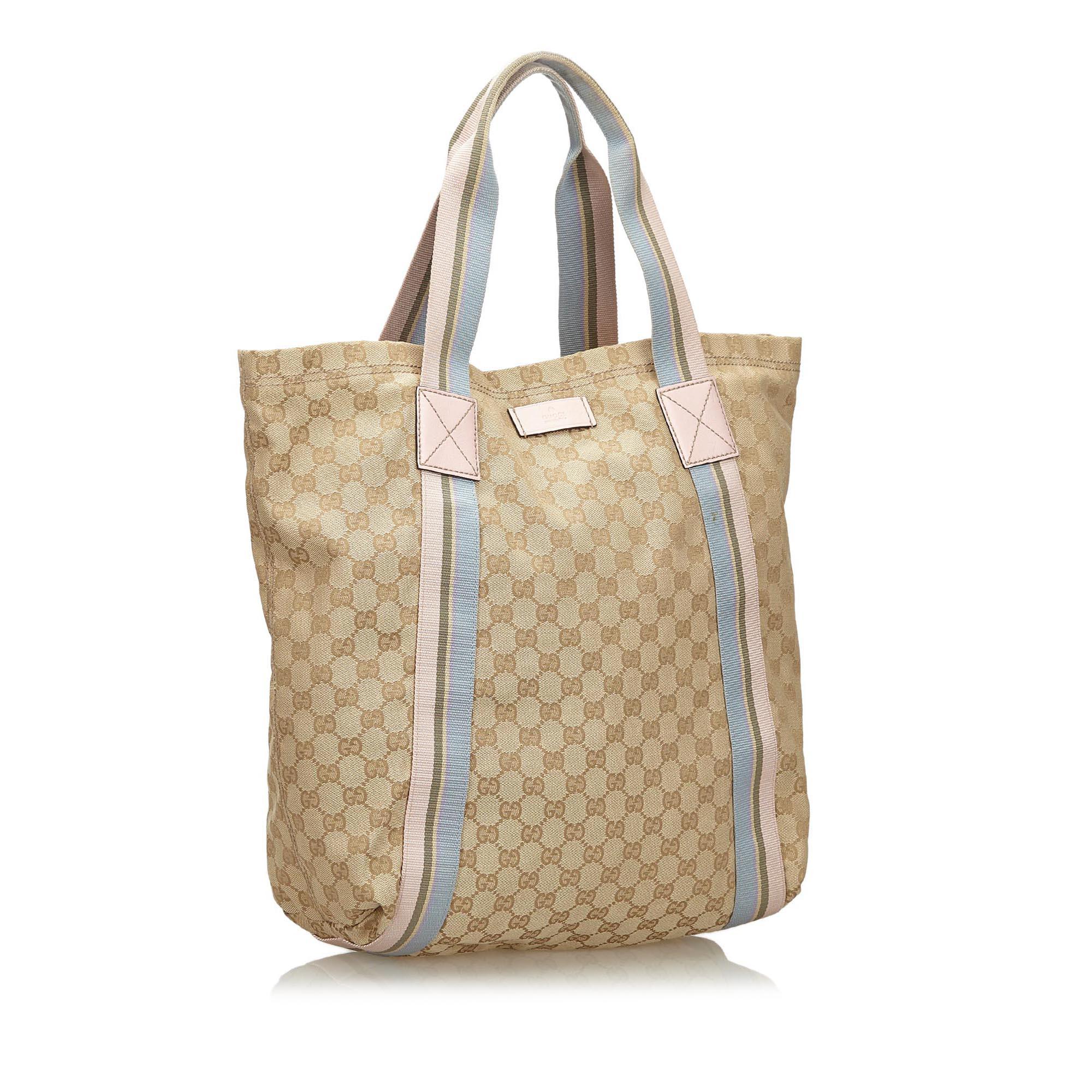 This tote bag features a jacquard body, flat straps, open top, and an interior open pocket. It carries as B+ condition rating.

Inclusions: 
This item does not come with inclusions.

Dimensions:
Length: 36.00 cm
Width: 30.50 cm
Depth: 12.00