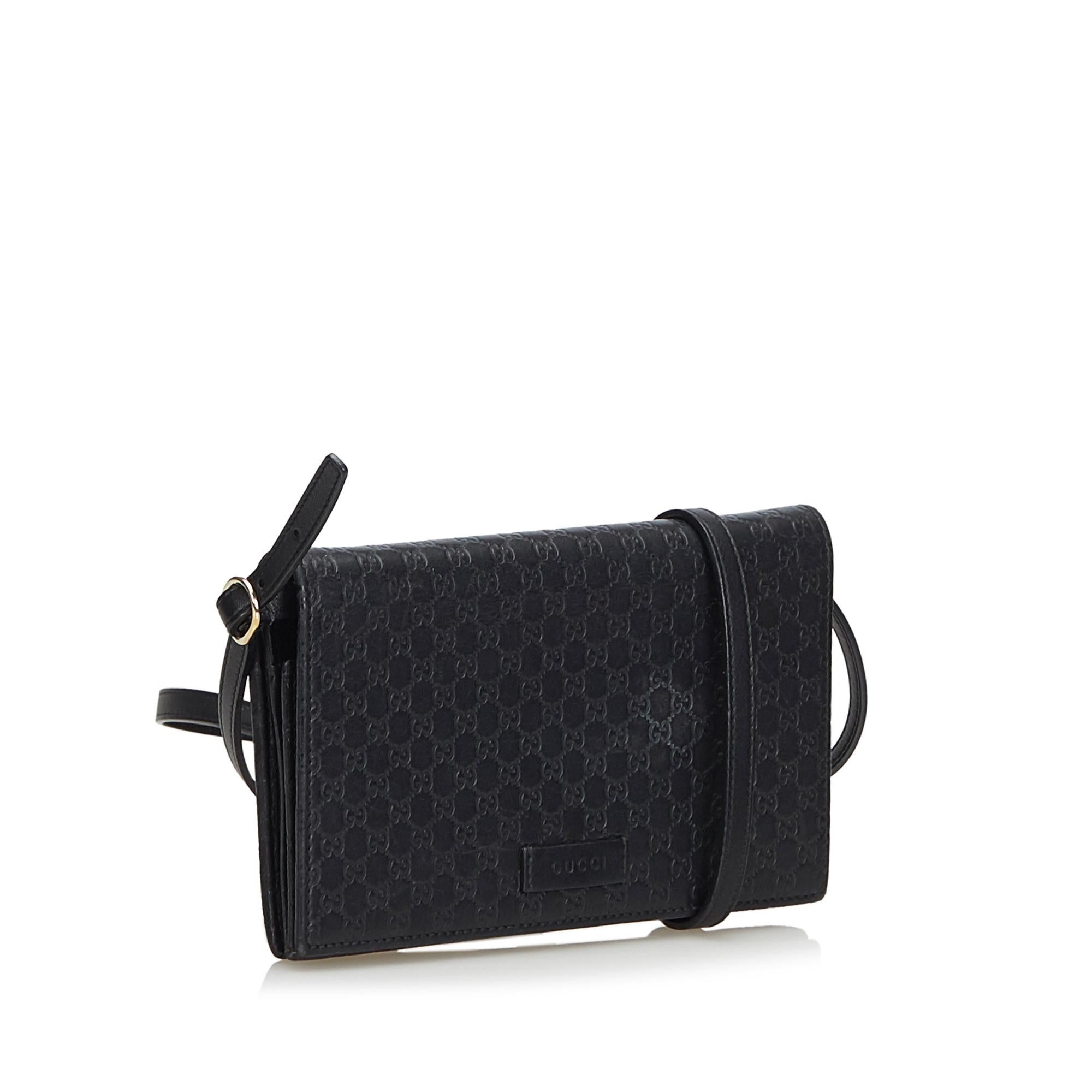 This long wallet features a leather body, a flat leather strap, a front flap with a magnetic closure, and interior zip and slip pockets. It carries as B+ condition rating.

Inclusions: 
This item does not come with inclusions.

Dimensions:
Length: