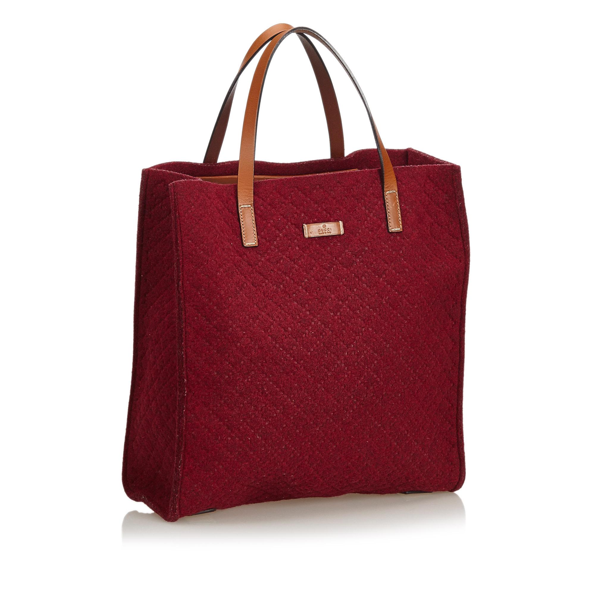 This tote bag features a felt body, flat leather handles, and an open top. It carries as AB condition rating.

Inclusions: 
This item does not come with inclusions.

Dimensions:
Length: 33.00 cm
Width: 31.50 cm
Depth: 12.00 cm
Hand Drop: 14.00