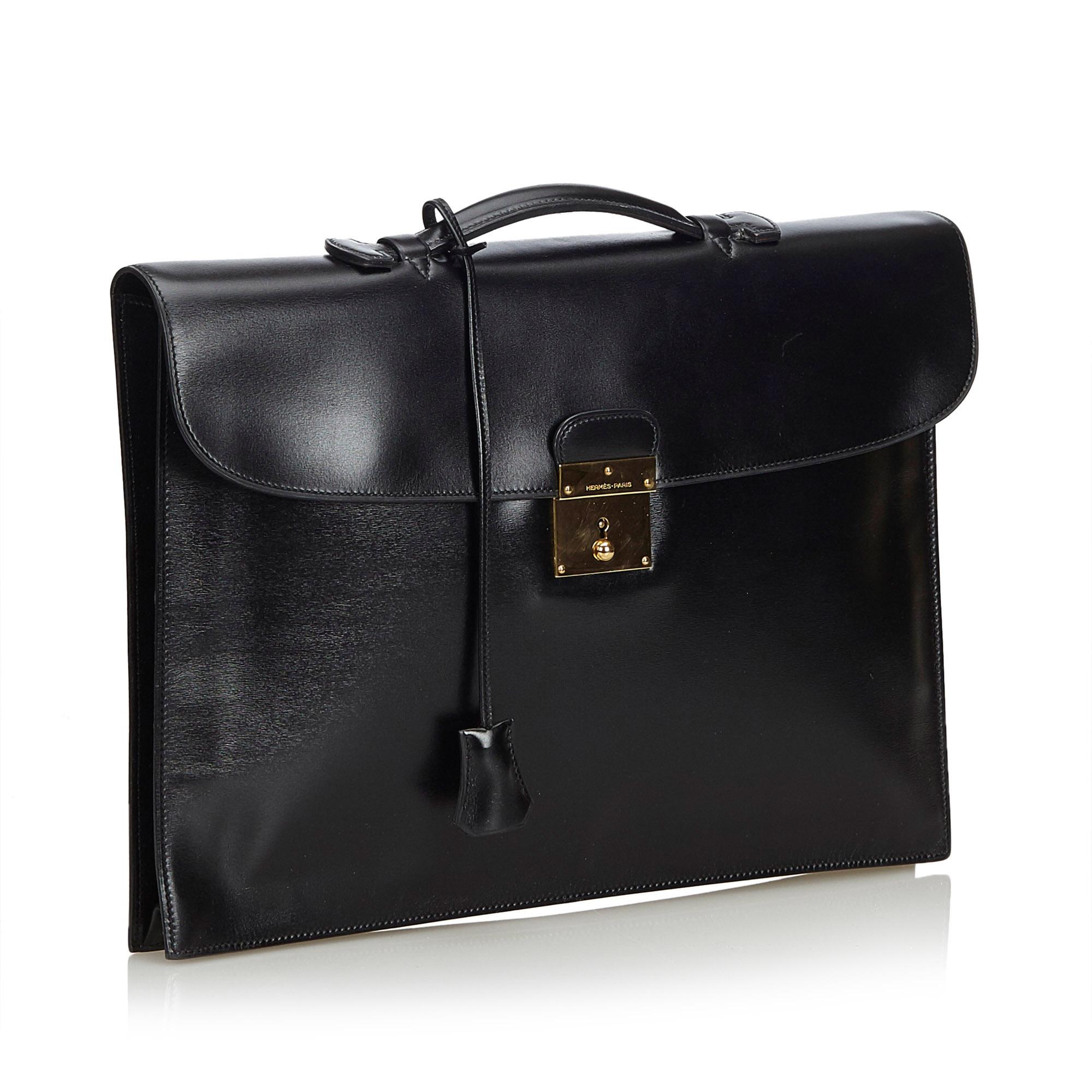 The Quirus bag features a box leather body, a flat leather top handle, and top flap with push lock closure. It carries as B+ condition rating.

Inclusions: 
This item does not come with inclusions.

Dimensions:
Length: 27.00 cm
Width: 37.00