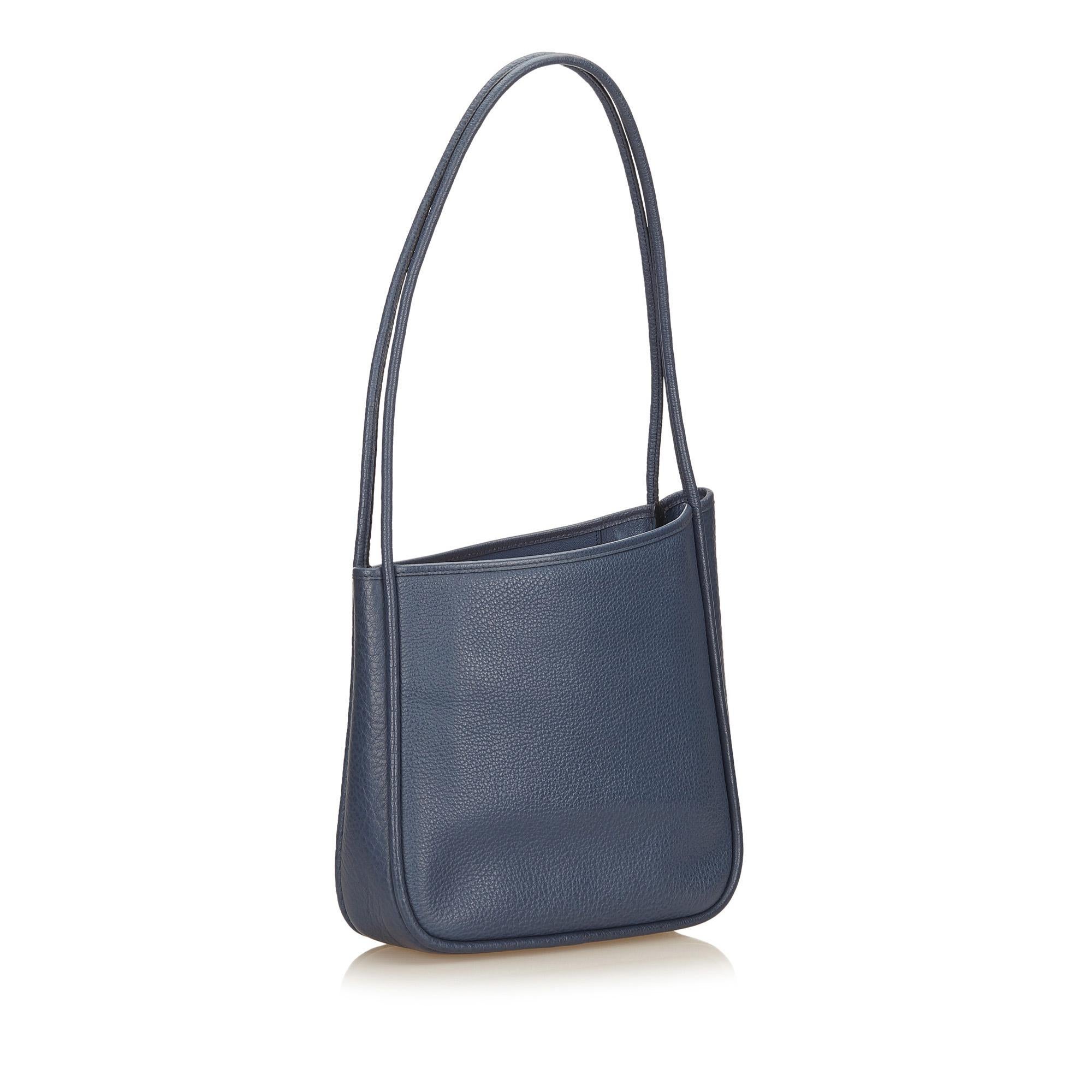 The Nami Tote features a leather body, rolled leather straps, open top, and interior zip and slip pocket. It carries as AB condition rating.

Inclusions: 
This item does not come with inclusions.

Dimensions:
Length: 28.00 cm
Width: 26.00 cm
Depth: