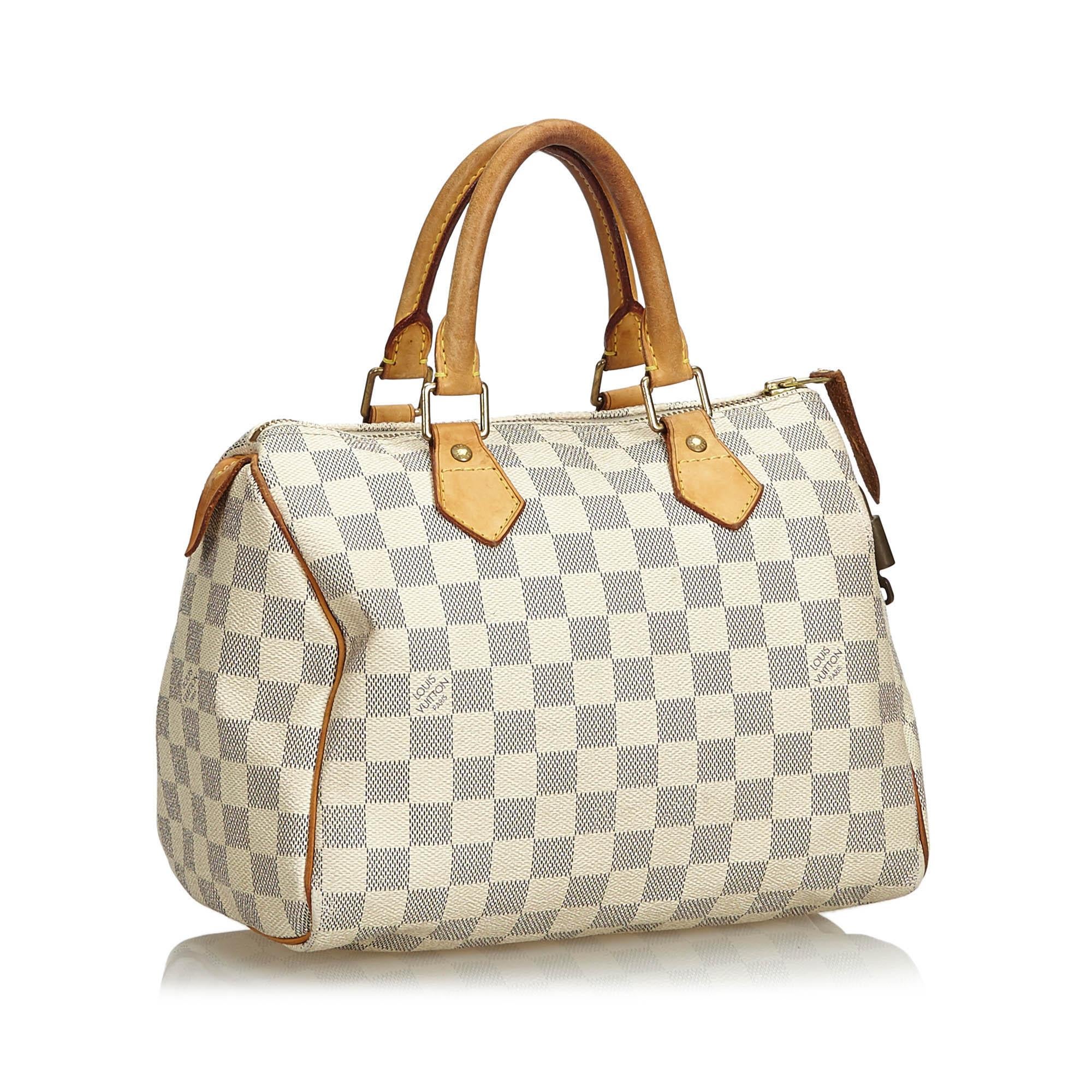 The Speedy 25 features a Damier Azur body, rolled handles, gold-tone hardware, and a top zip closure. It carries as B condition rating.

Inclusions: 
Padlock
Padlock


Louis Vuitton pieces do not come with an authenticity card please refer to the