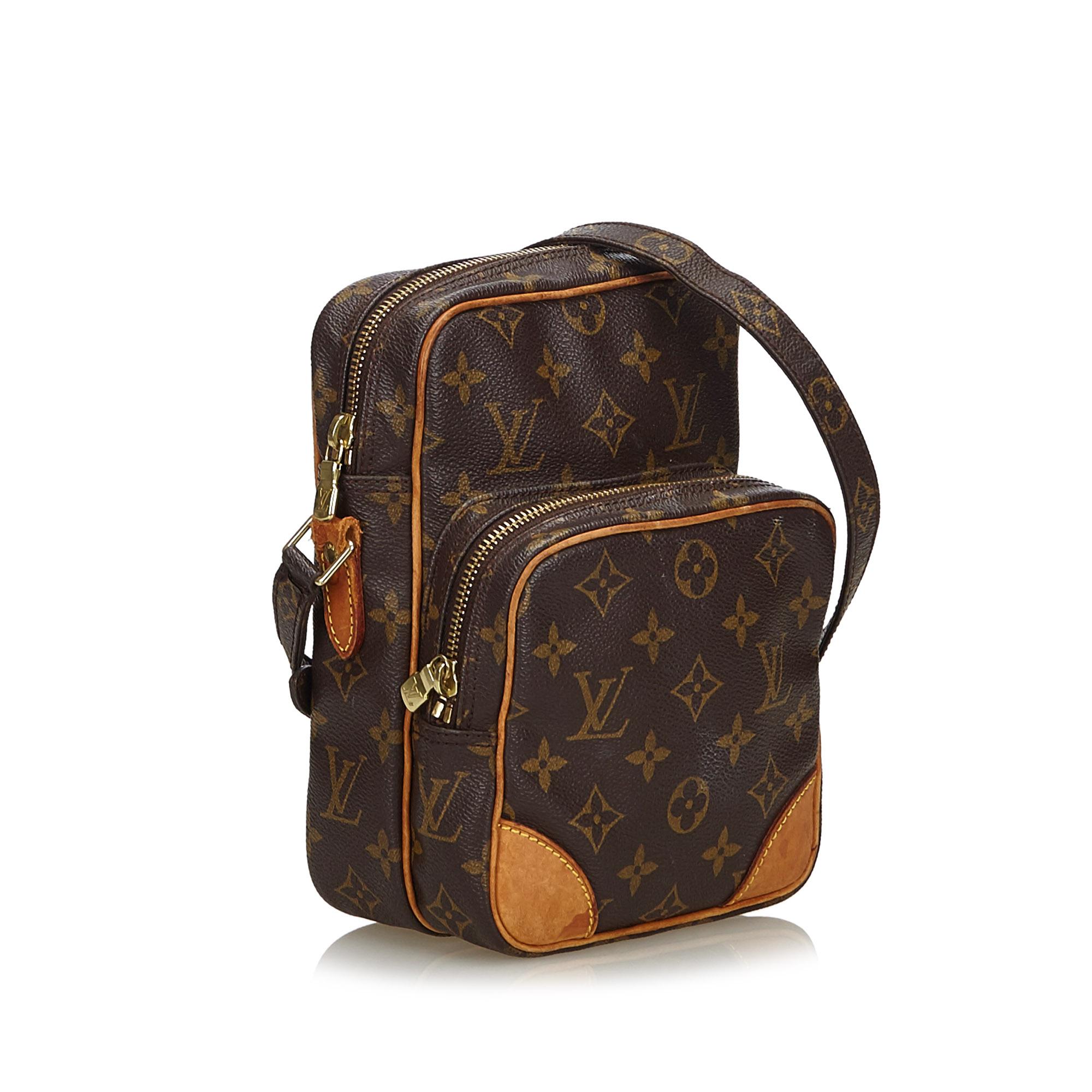 The Amazone features a monogram canvas body, a front exterior zip pocket, an adjustable shoulder strap, a top zip closure, and an interior slip pocket. It carries as B condition rating.

Inclusions: 
Dust Bag


Louis Vuitton pieces do not come with