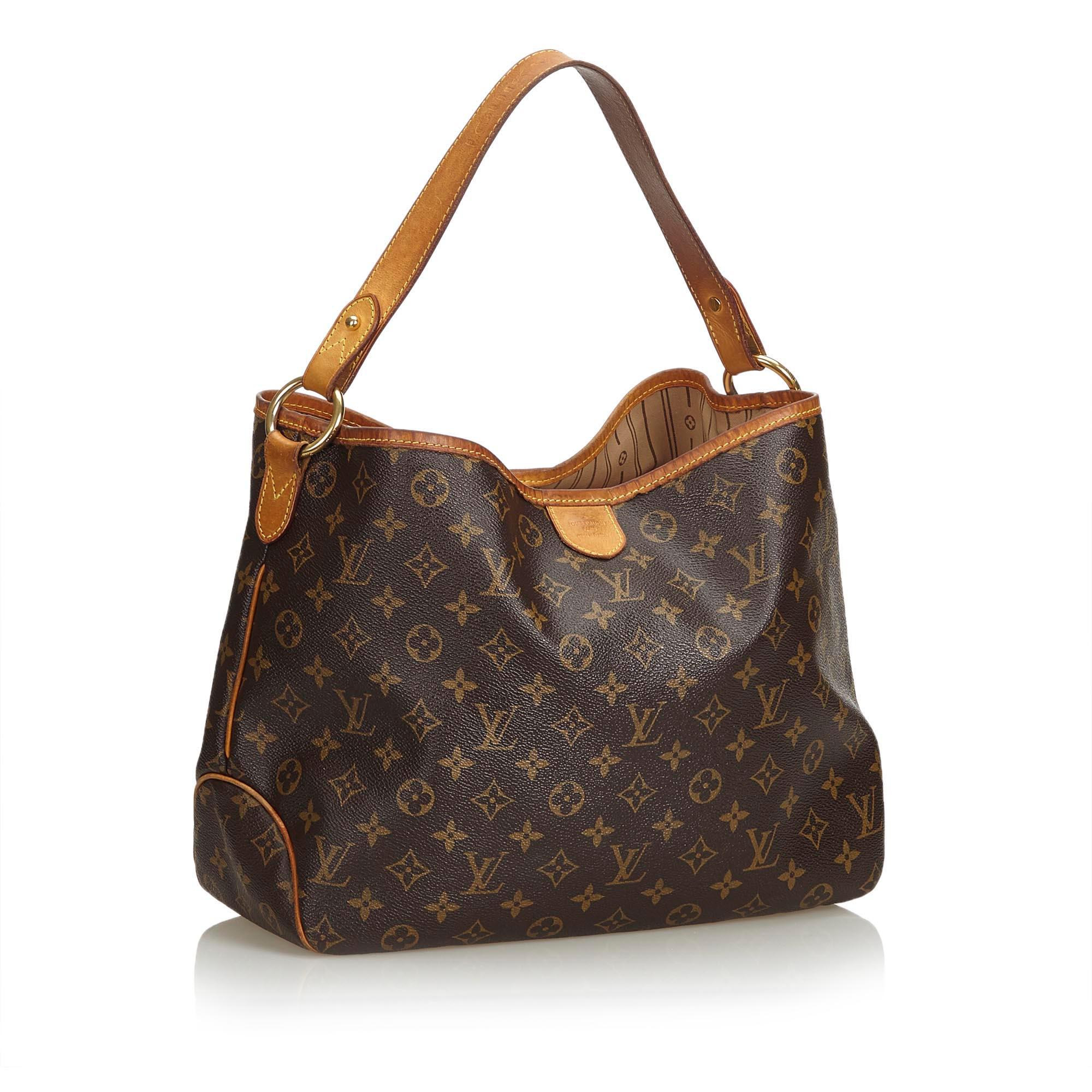 The Delightful PM features a monogram canvas body, flat leather strap, open top, and interior zip pocket. It carries as B condition rating.

Inclusions: 
This item does not come with inclusions.


Louis Vuitton pieces do not come with an