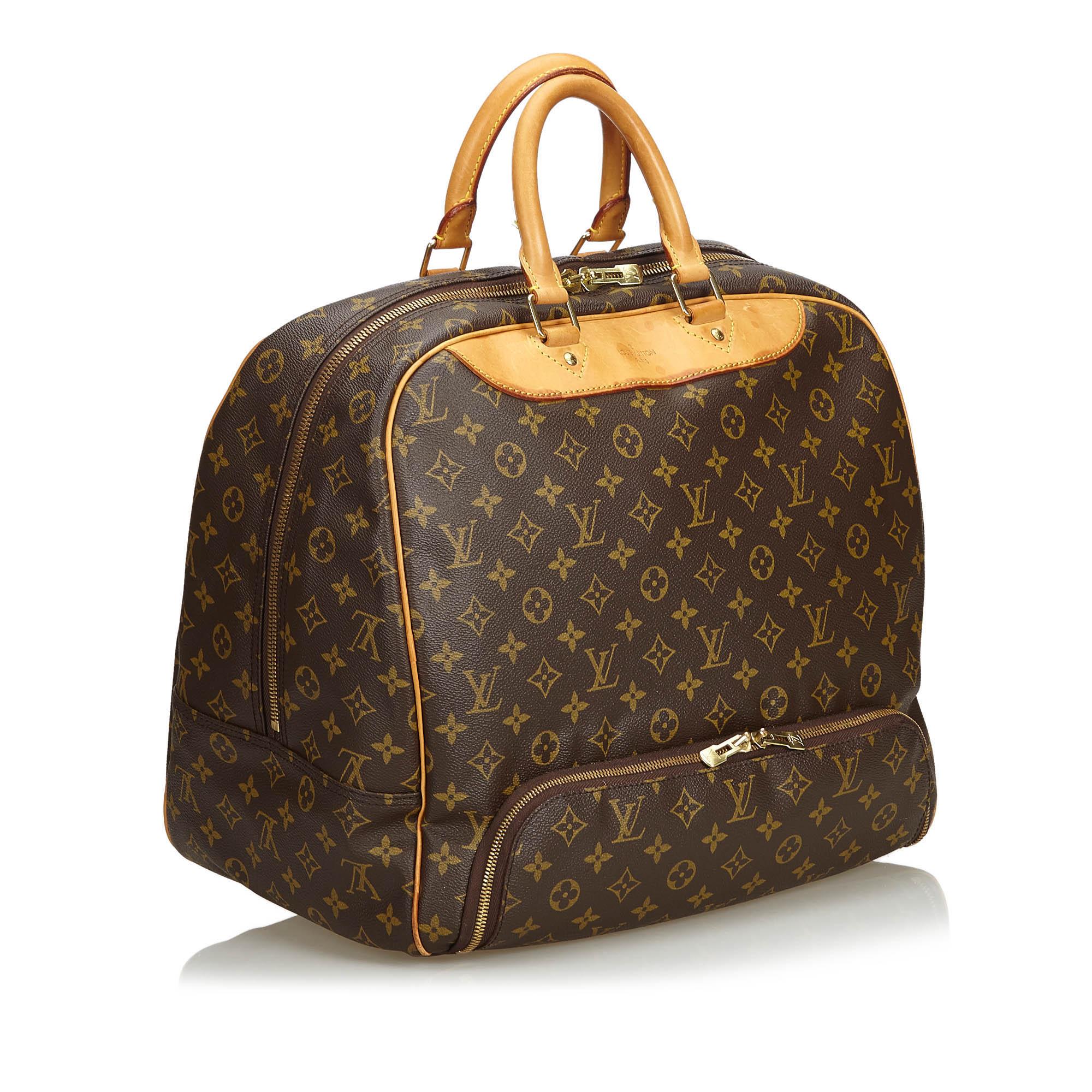 The Evasion features a monogram canvas body, rolled vachetta leather handles, a front exterior zip pocket, a top zip closure, and an interior slip pocket. It carries as B condition rating.

Inclusions: 
This item does not come with