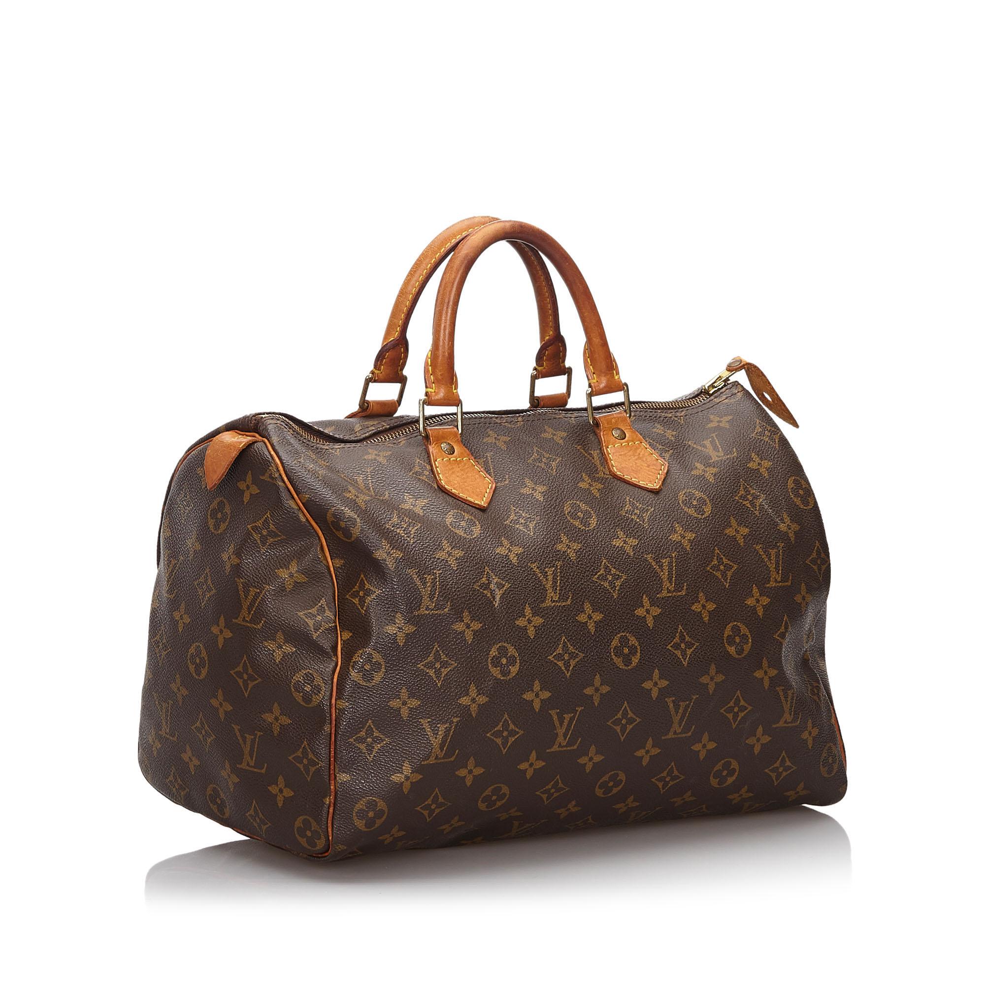 The Speedy 35 features the Monogram canvas, vachetta handles and trim, a top zip closure, and an interior pocket. It carries as B+ condition rating.

Inclusions: 
Padlock

Louis Vuitton pieces do not come with an authenticity card please refer to