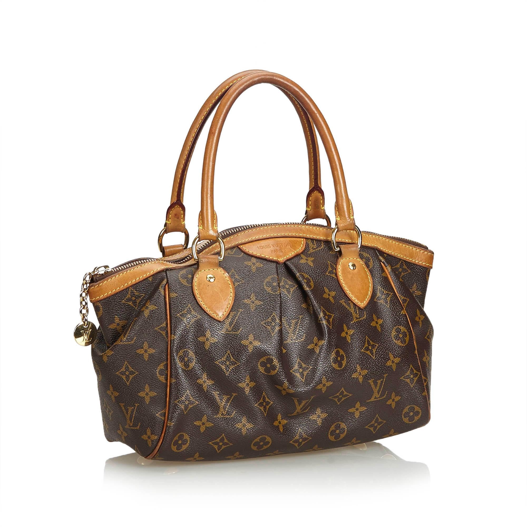 The Tivoli PM features a monogram canvas body, rolled leather straps, top zip closure, and interior slip pockets. It carries as B condition rating.

Inclusions: 
This item does not come with inclusions.


Louis Vuitton pieces do not come with an