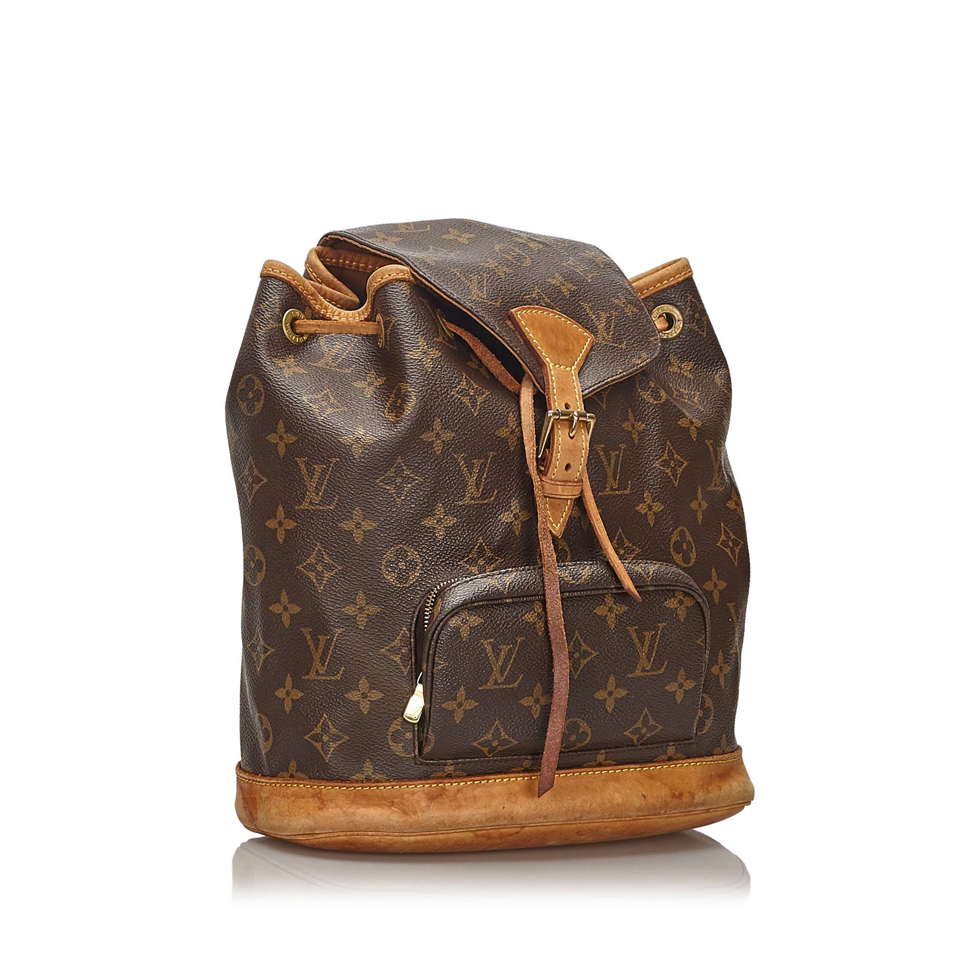 The Montsouris MM features a monogram canvas body, a front zip pocket, a front flap with a belt buckle detail, and a top drawstring closure. It carries as B condition rating.

Inclusions: 
This item does not come with inclusions.


Louis Vuitton