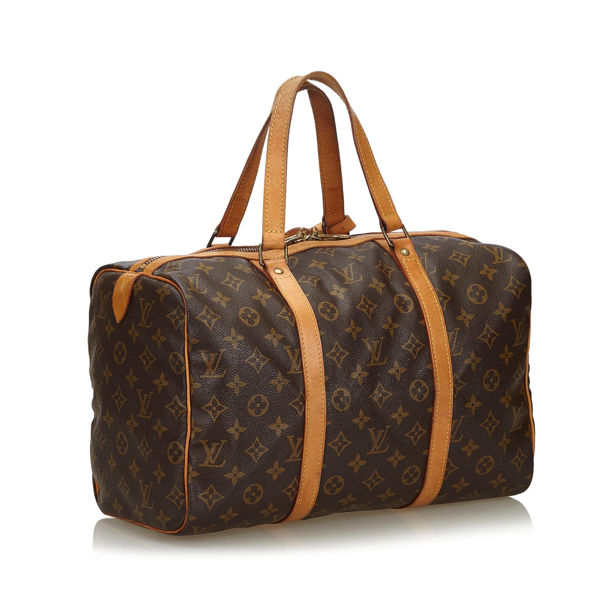 The Sac Souple 35 features a monogram canvas body, flat leather straps, and a top zip closure. It carries as B condition rating.

Inclusions: 
This item does not come with inclusions.


Louis Vuitton pieces do not come with an authenticity card