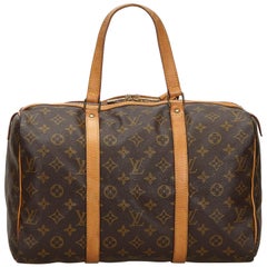 Sac souple 48h bag Louis Vuitton Brown in Plastic - 31796707