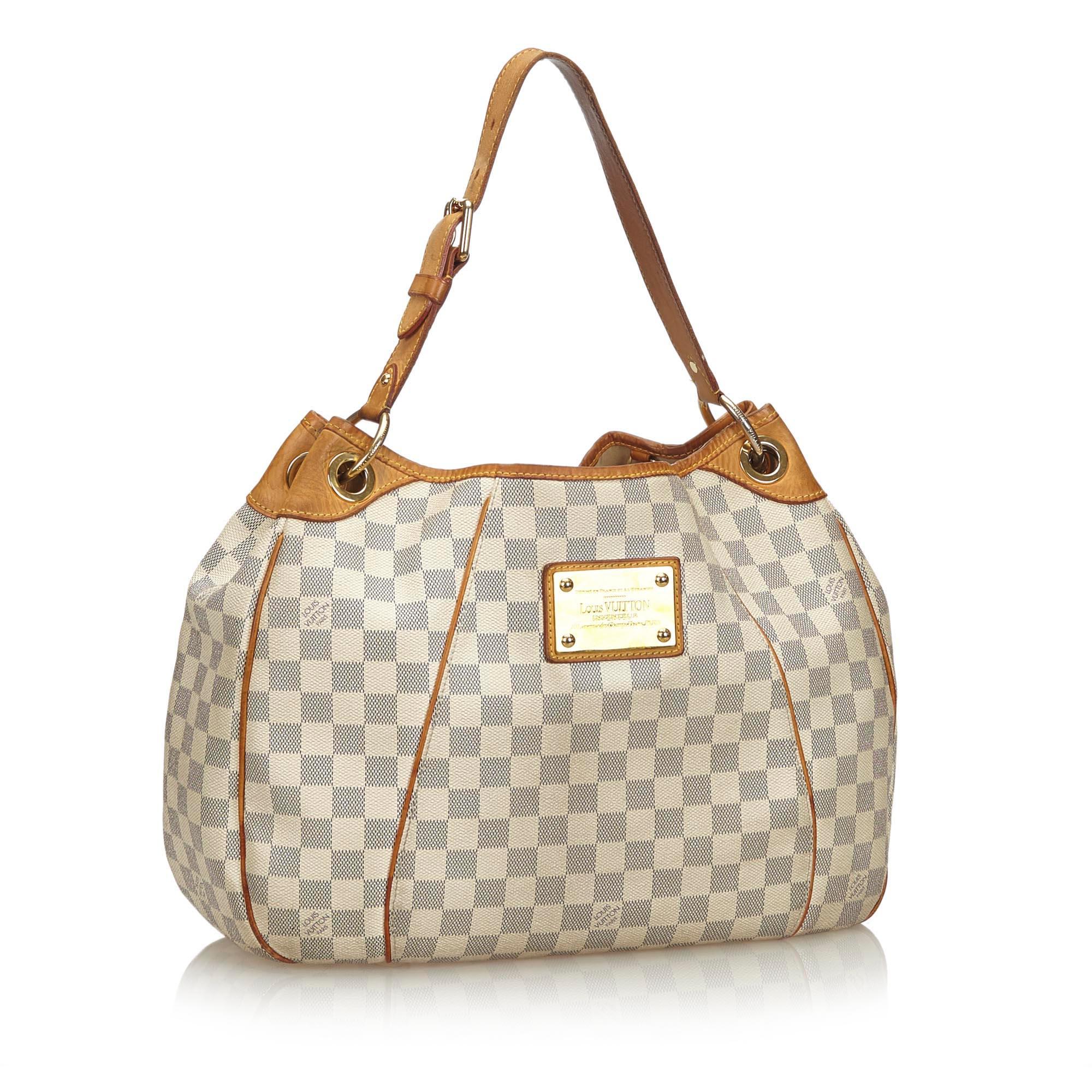 The Galliera PM features a damier azur canvas body with Vachetta leather trim, flat vachetta strap, an open top with a magnetic closure, and an interior flap pocket. It carries as B+ condition rating.

Inclusions: 
This item does not come with