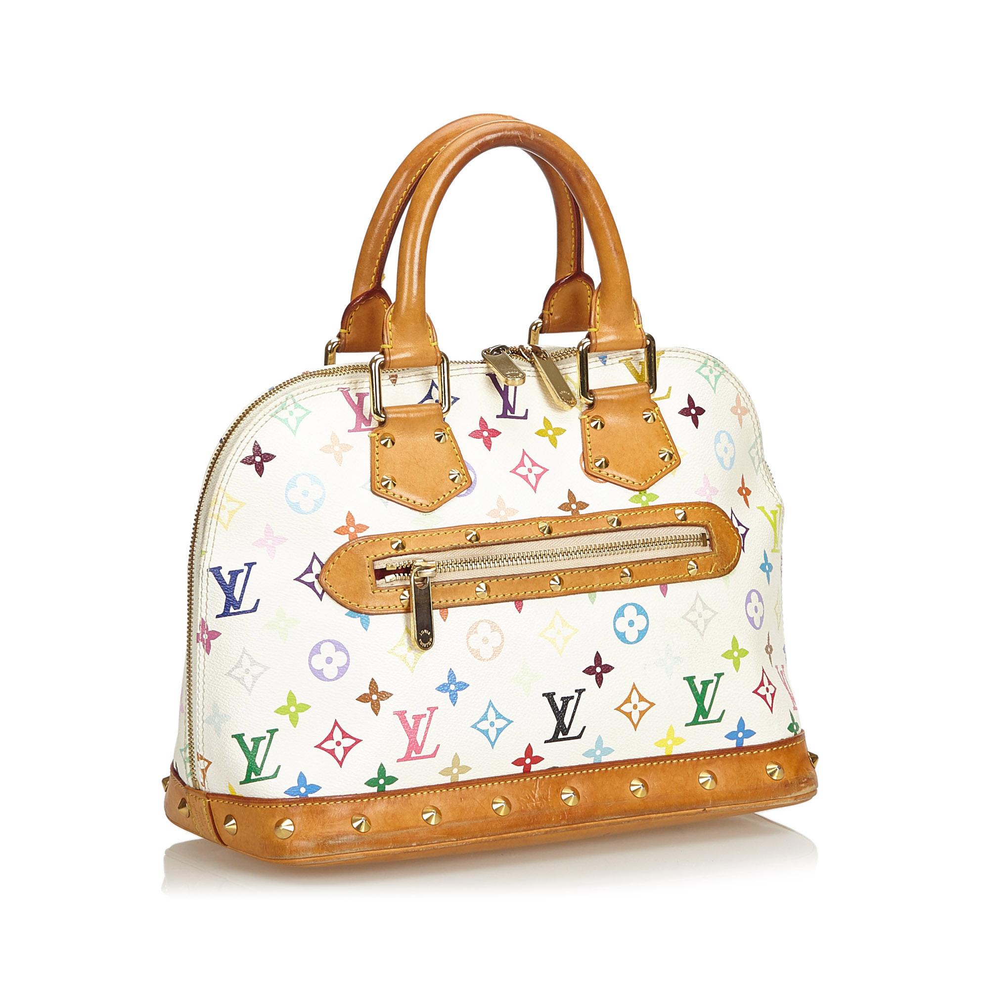 The Alma PM features the Monogram Multicolore canvas, rolled vachetta handles, vachetta trim, a studded base, an exterior zip pocket, a two-way zip around closure, and interior flat and cell pocket. It carries as B condition rating.

Inclusions: