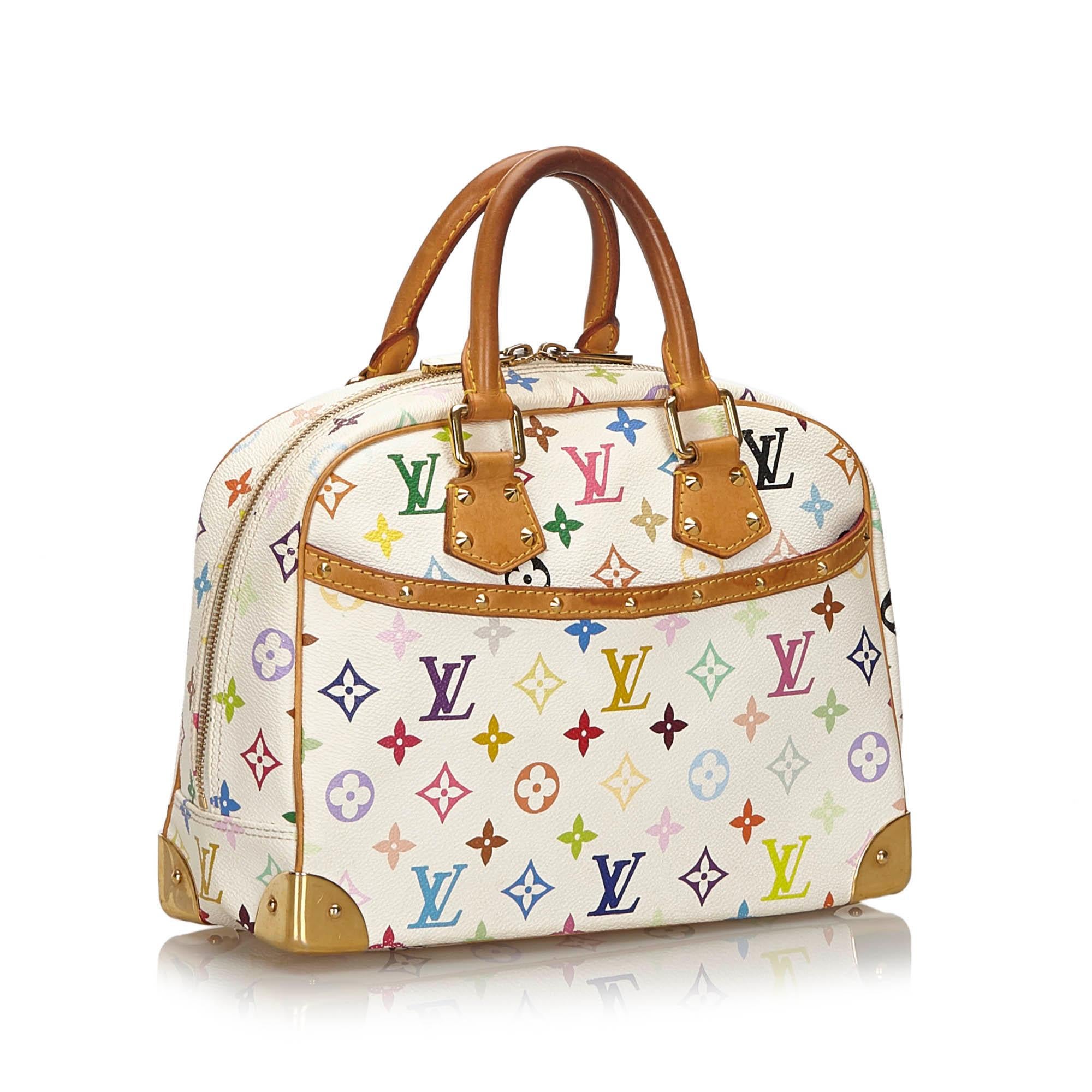 The Trouville features a monogram multicolore canvas body, gold-tone studs, rolled leather handles, an exterior slip pocket, a top zip closure, and interior slip pockets. It carries as B+ condition rating.

Inclusions: 
This item does not come with