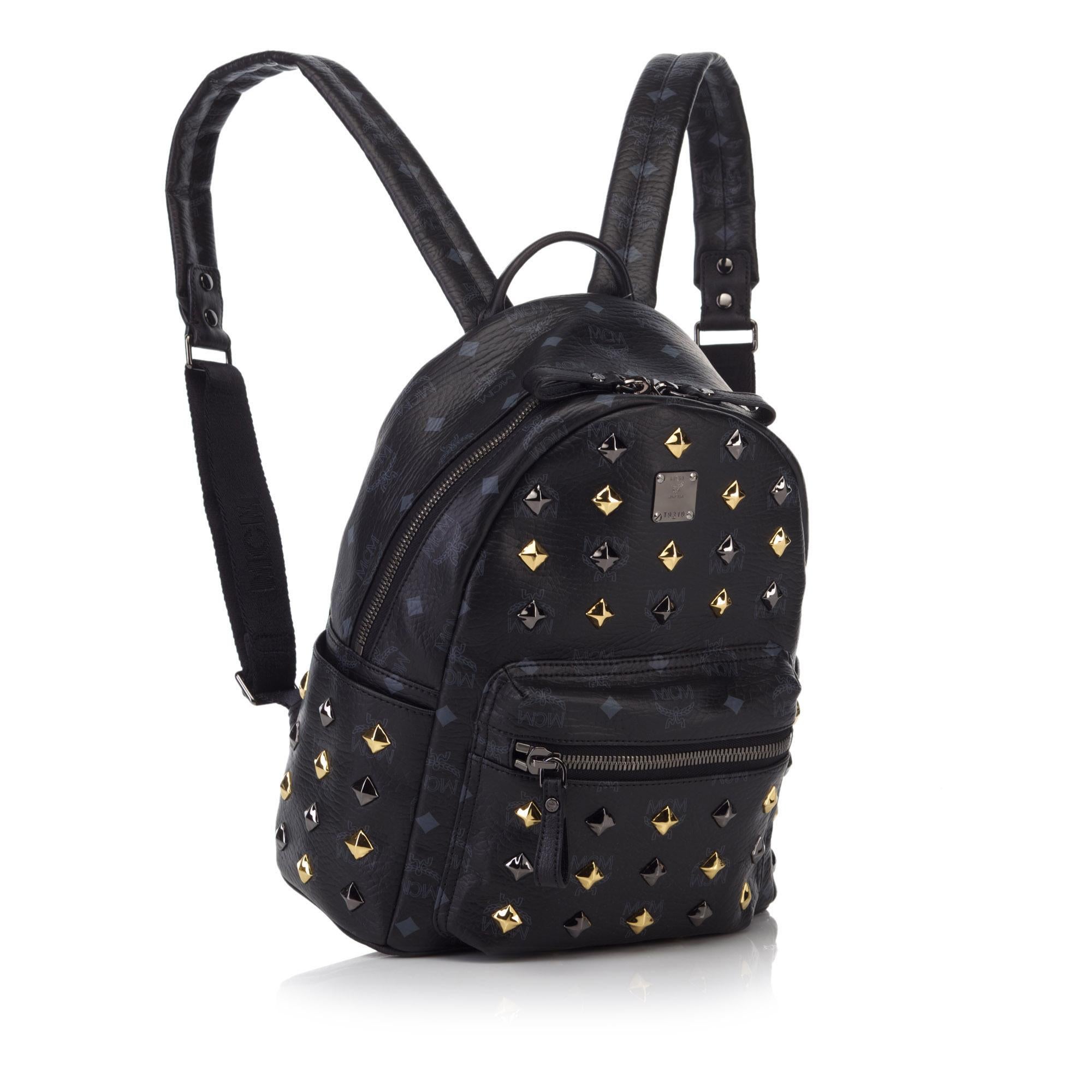 The Stark backpack features a studded leather body, flat straps, exterior slip and zip pockets, a top zip closure, and interior zip, slip, and open pockets. It carries as AB condition rating.

Inclusions: 
Dust Bag
Dimensions:
Length: 25.50
