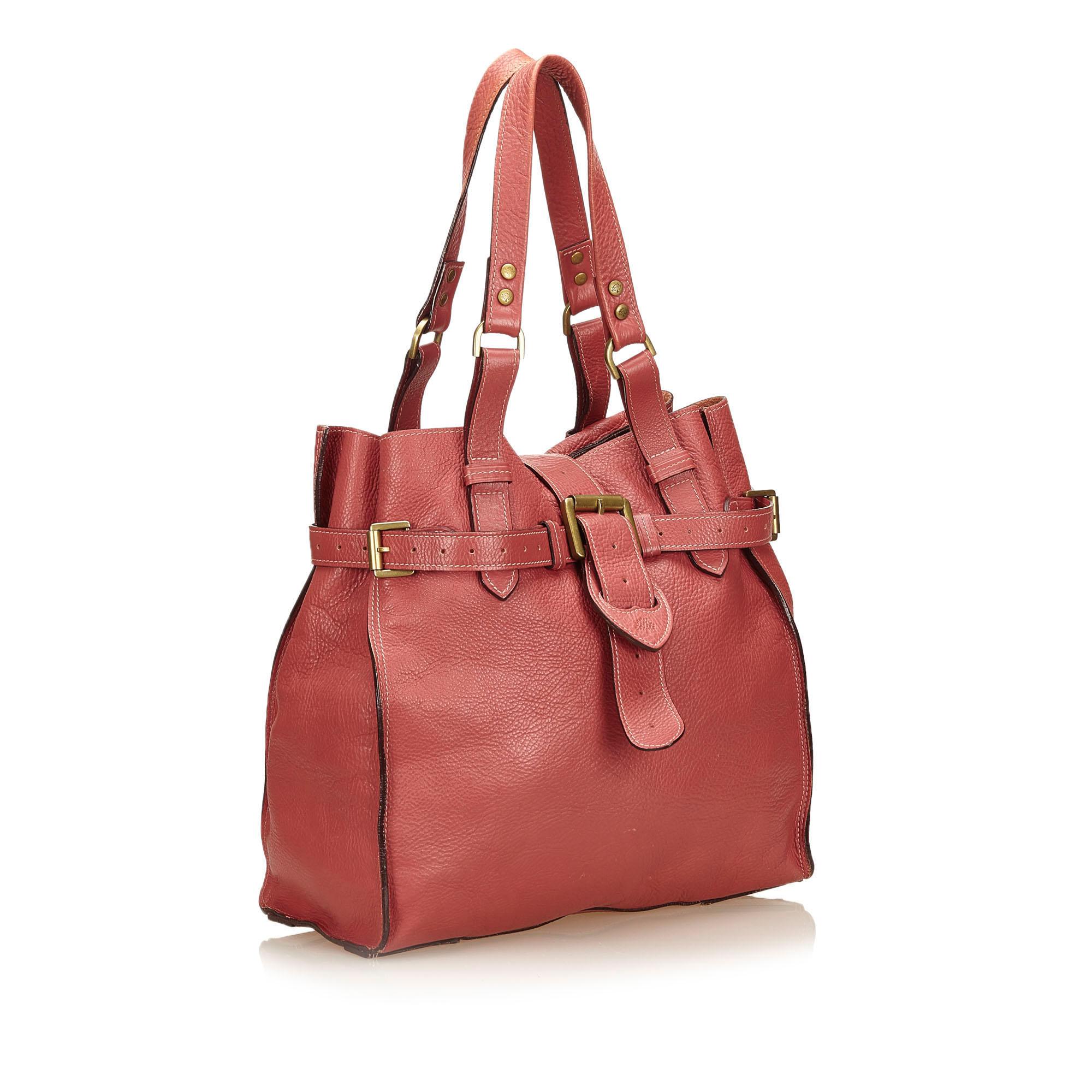 This shoulder bag features a leather body with belt details, flat leather straps, front flap with belt details, and interior zip pocket. It carries as B condition rating.

Inclusions: 
This item does not come with inclusions.

Dimensions:
Length:
