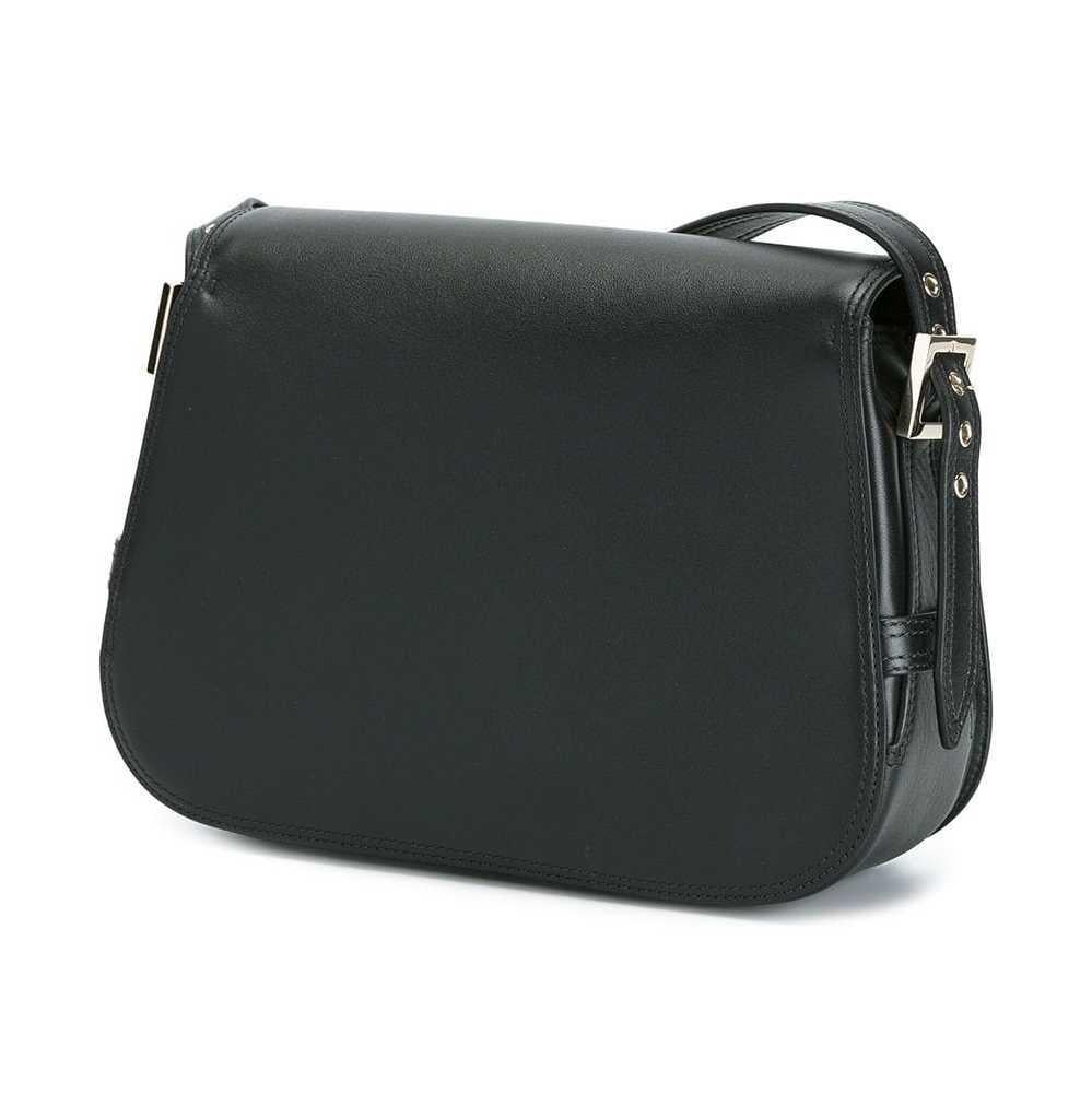 This shoulder bag features a leather body, a flat leather strap, a front flap with a metal push lock closure, and an interior zip pocket. It carries as AB condition rating.

Inclusions: 
This item does not come with inclusions.

Dimensions:
Length: