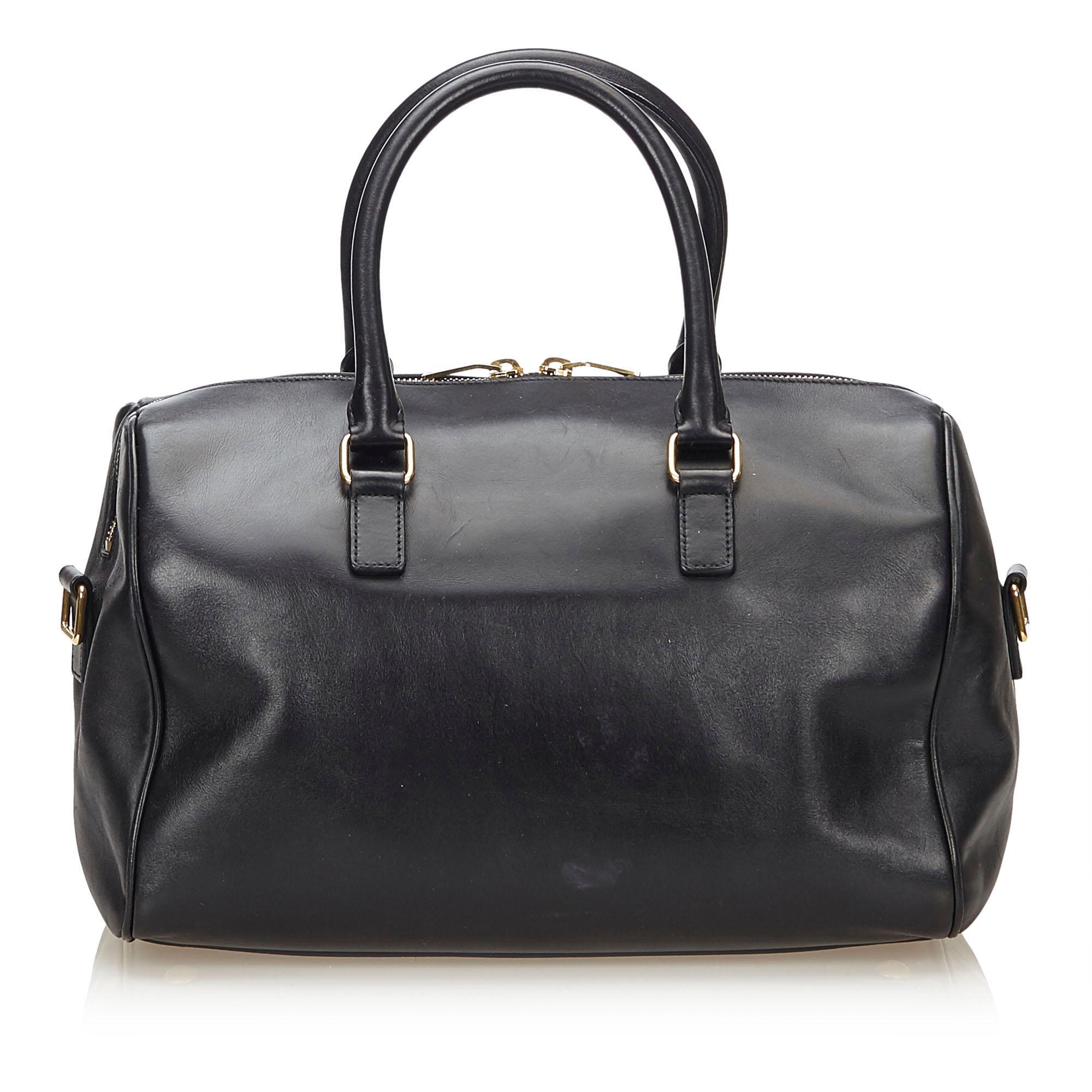Vintage Authentic YSL Black Leather Classic Duffle 6 France MEDIUM  In Good Condition For Sale In Orlando, FL