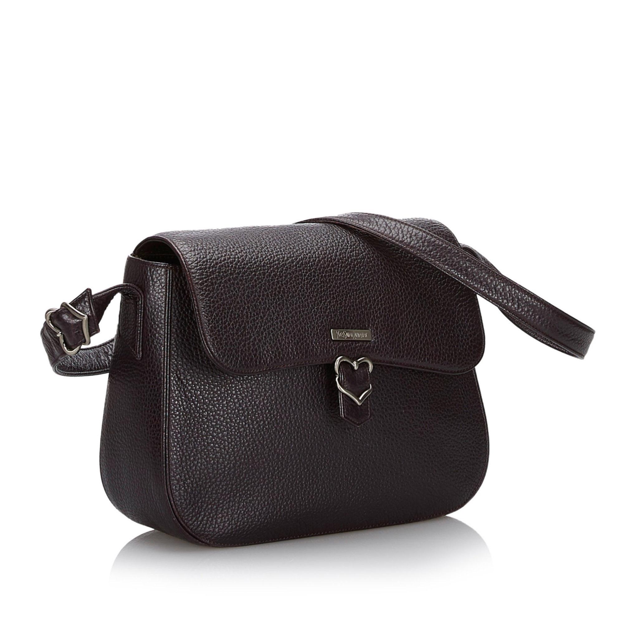 This crossbody bag features a leather body, a flat leather strap, a top flap with a magnetic closure, and interior zip and slip pockets. It carries as B+ condition rating.

Inclusions: 
This item does not come with inclusions.

Dimensions:
Length: