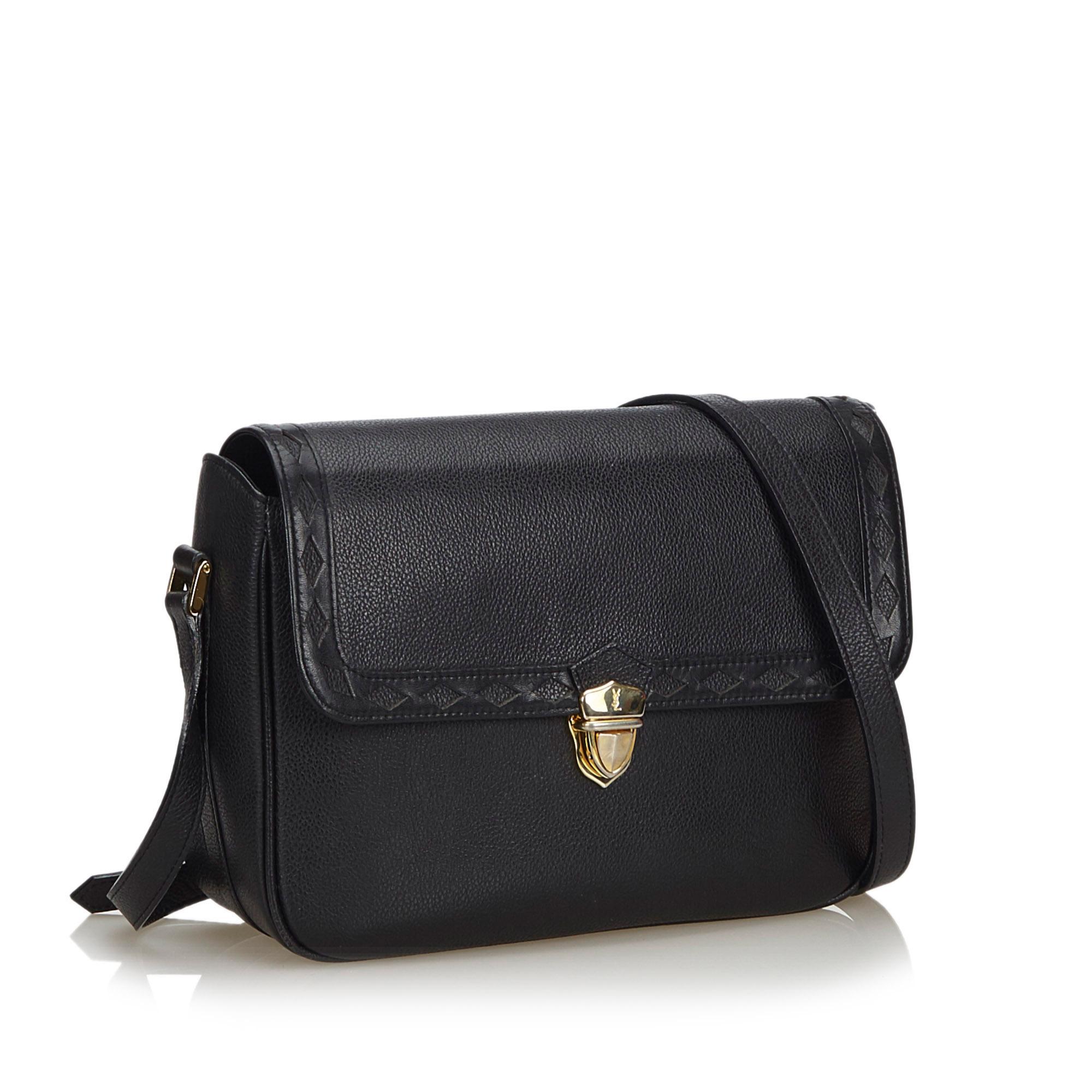 This crossbody bag features a leather body, a flat leather strap, a top flap with a push lock closure, and interior zip and slip pockets. It carries as B+ condition rating.

Inclusions: 
This item does not come with inclusions.

Dimensions:
Length:
