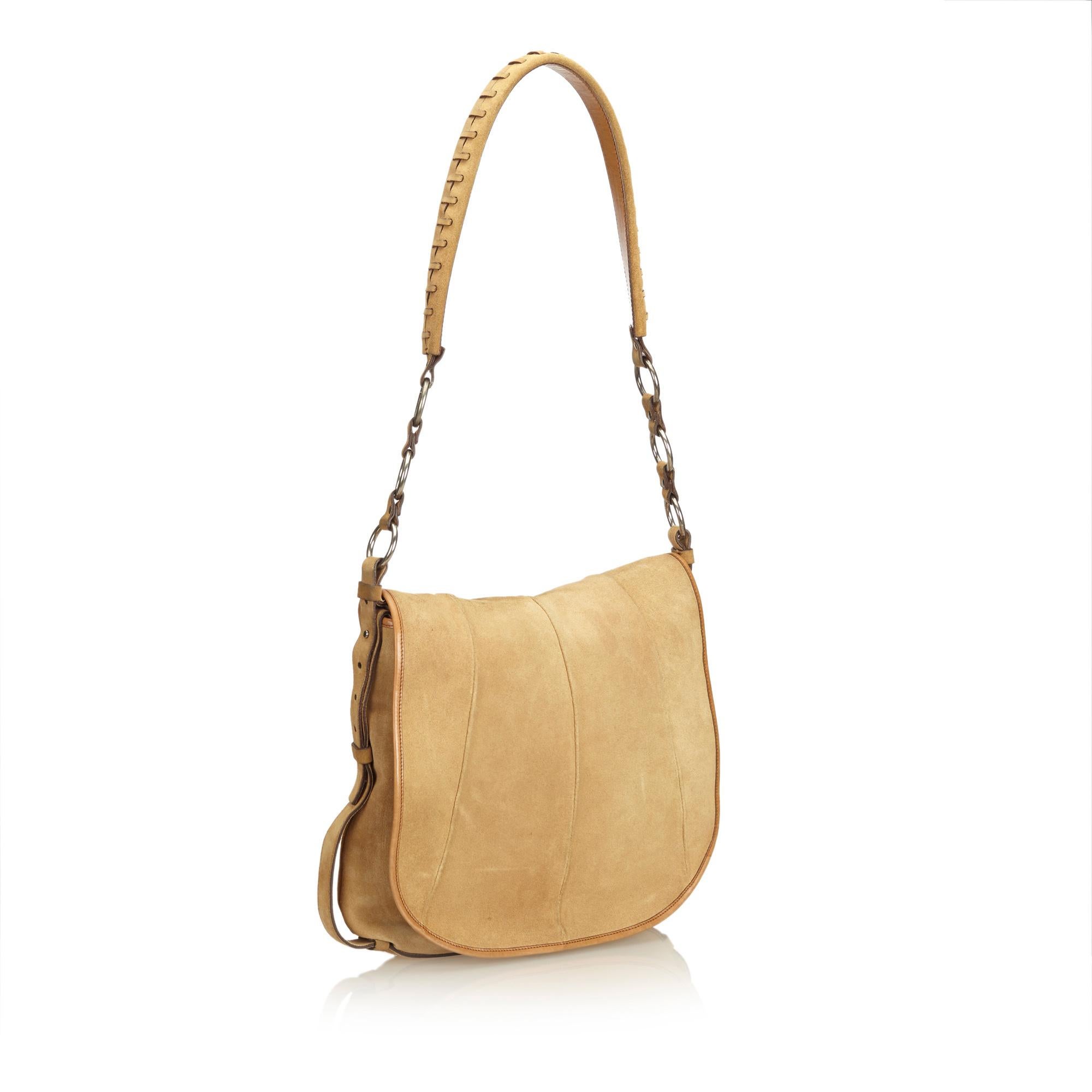 This shoulder bag features a nubuck body, braided leather strap, front flap, and interior zip and slip pockets. It carries as AB condition rating.

Inclusions: 
Dust Bag

Dimensions:
Length: 30.00 cm
Width: 32.50 cm
Depth: 5.00 cm
Shoulder Drop: