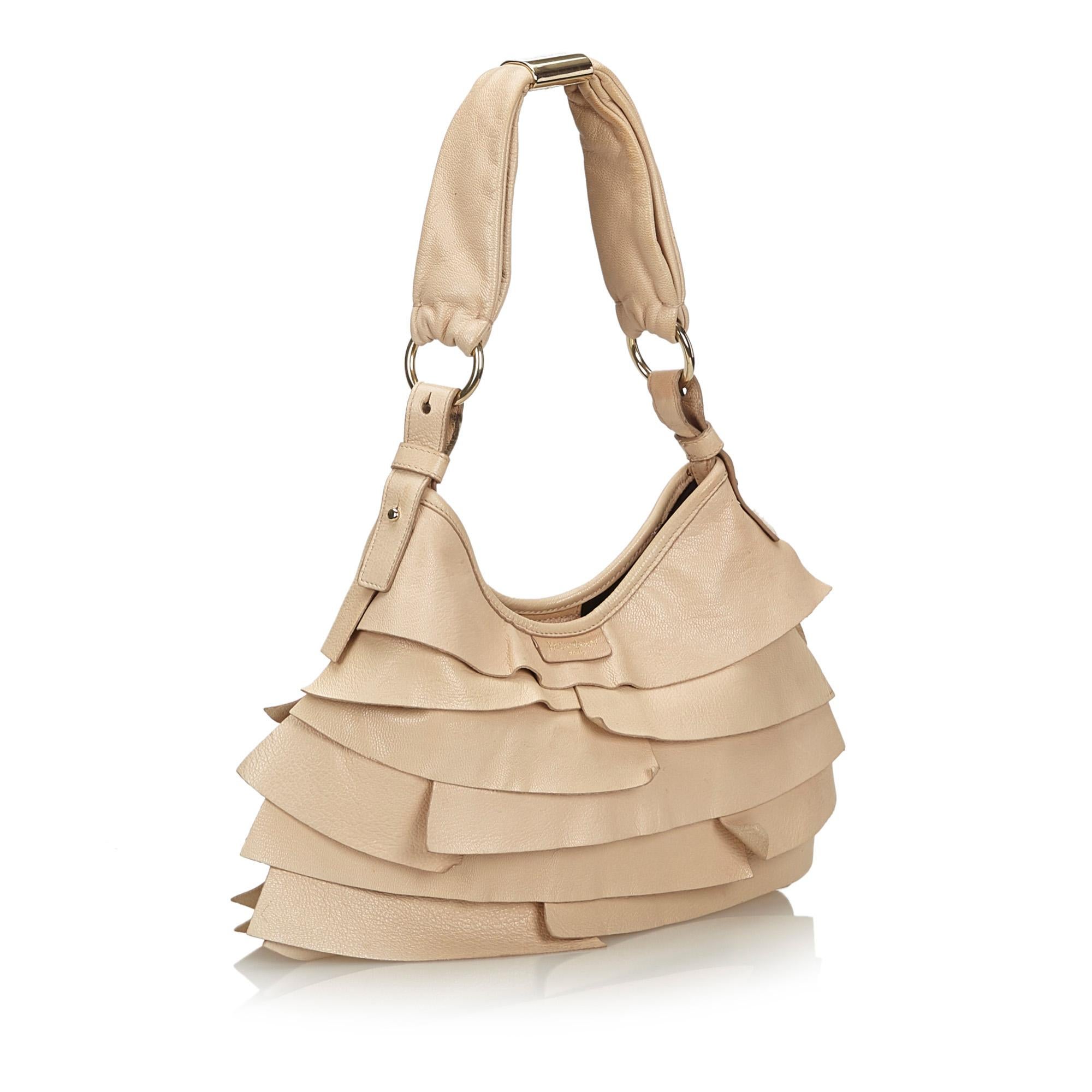 The Saint Tropez features a ruffled leather body, a leather strap, a top magnetic closure, and interior zip and slip pockets. It carries as B+ condition rating.

Inclusions: 
This item does not come with inclusions.

Dimensions:
Length: 23.00