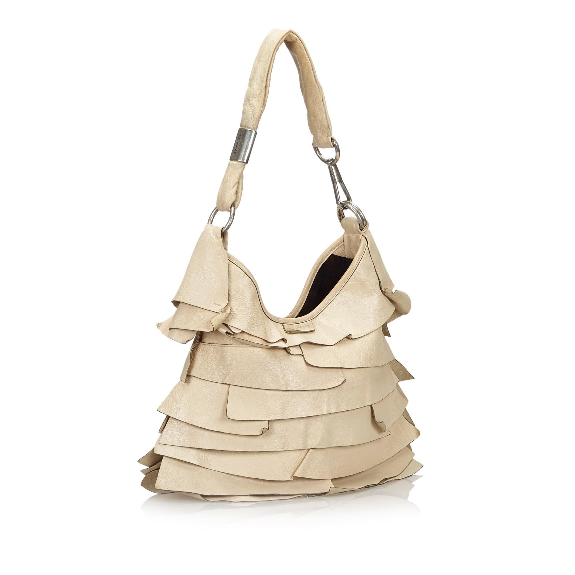 The Saint Tropez features a ruffled leather body, a leather strap, a top magnetic closure, and interior zip and slip pockets. It carries as B+ condition rating.

Inclusions: 
This item does not come with inclusions.

Dimensions:
Length: 24.00