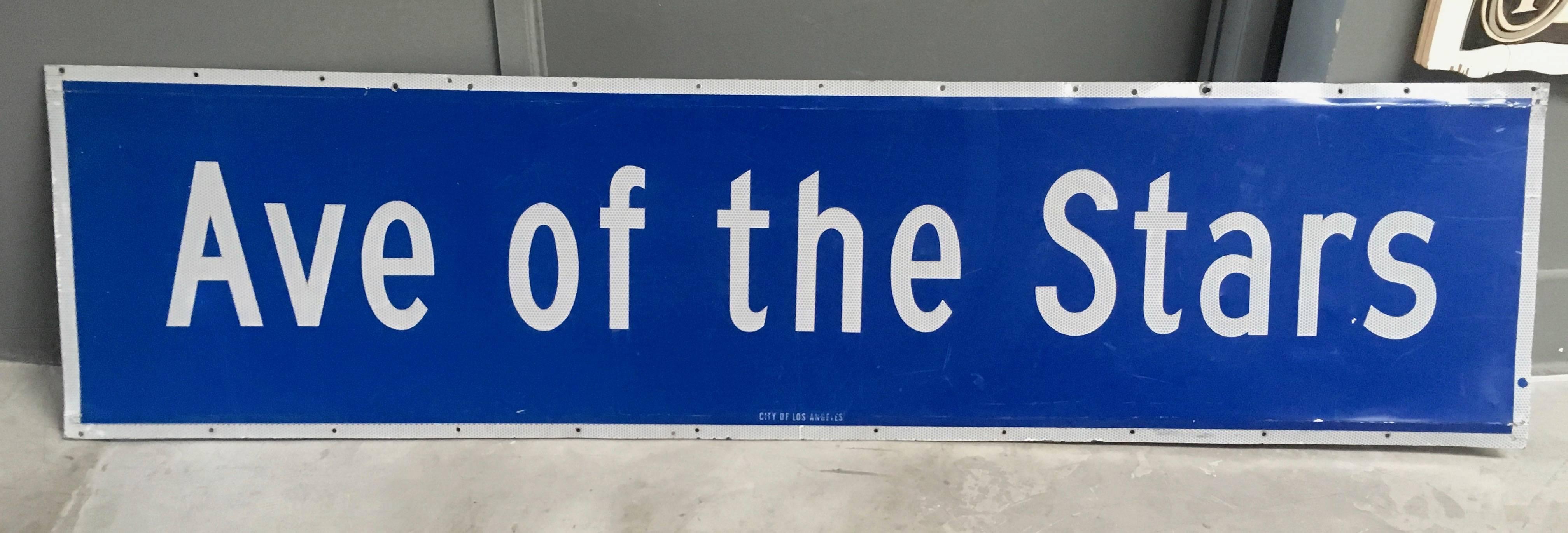 Very cool blue and white metal street sign from Los Angeles depicting 