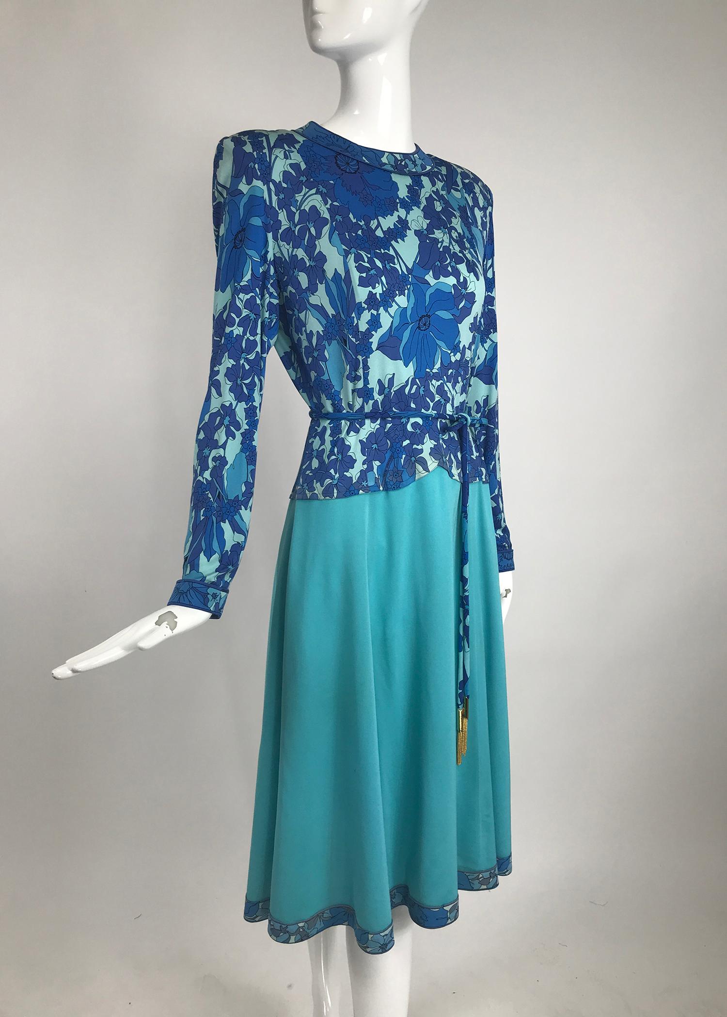 Vintage Averado Bessi turquoise print silk jersey dress and belt. Vibrant print in the style of Pucci, this Bessi Dress is perfect for any occasion. Banded jewel neckline, long sleeves with banded cuffs, the bodice and hip is done in the print, the
