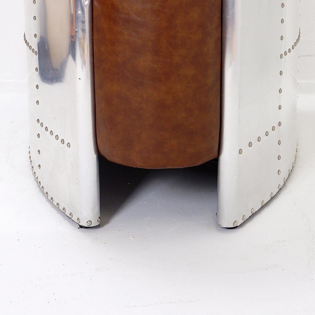 Industrial - Aviator armchair Timothy Oulton Style
Measures : 76x82cm H:81cm SH:41cm 
Material : Leather - Aluminium - Wooden structure
Wear consistent with age and use.
