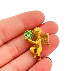Vintage AVON gold angel cherub peridot rhinestone stick pin