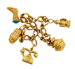 AVON Bracelet chaîne à breloques vintage en or