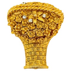 Vintage AVON gold rhinestone flower perfume designer runway brooch