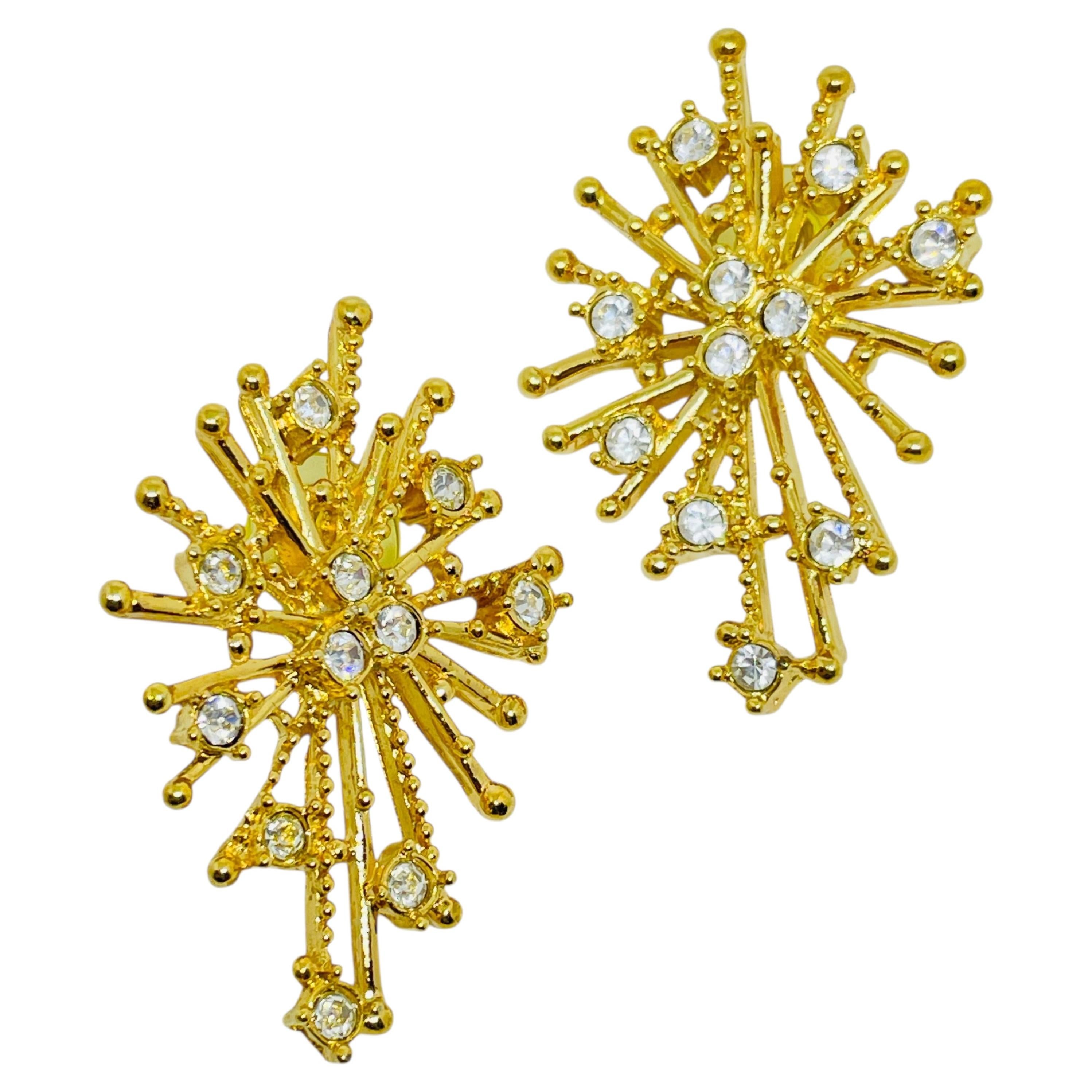 Vintage AVON gold tone rhinestone snowflake designer pierced earrings