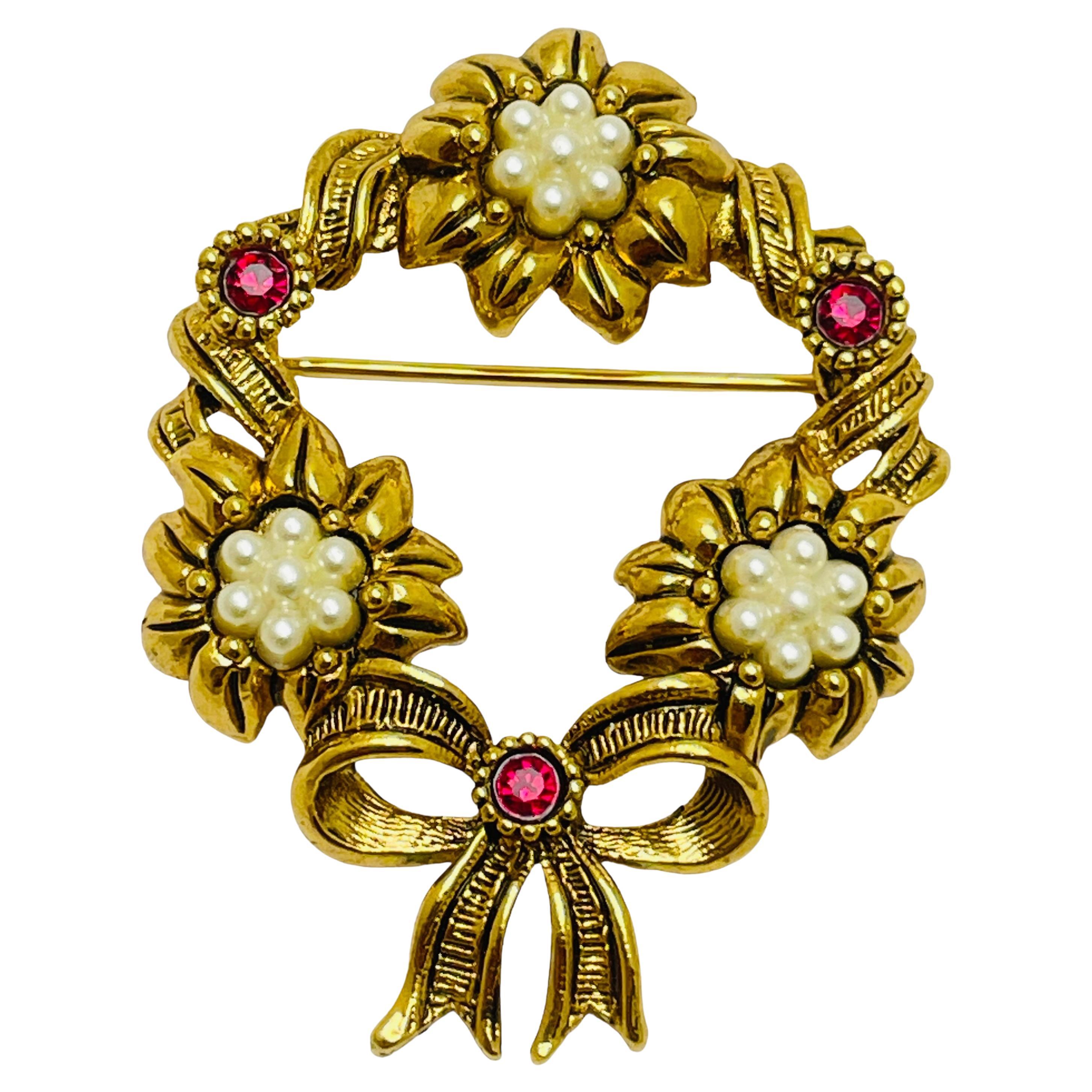 Vintage AVON signed gold tone rhinestone wreath bow designer brooch For Sale