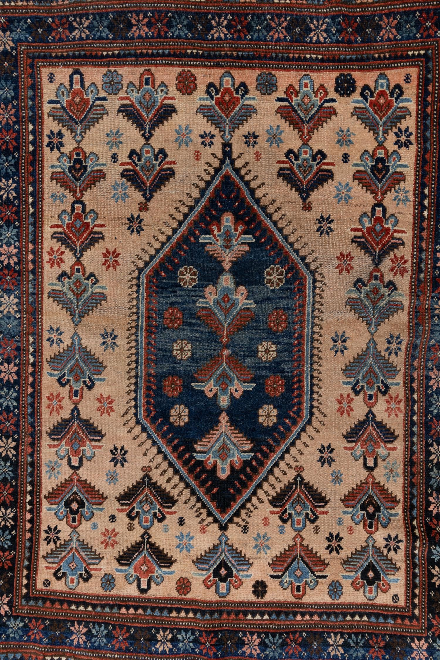 Beautiful original colors with a unique warm toned field. Woven in the second quarter of the 20th century. Full original pile.

Wear Notes: 1

Wear Guide: 
Wear Notes: 4

Wear Guide:
Vintage and antique rugs are by nature, pre-loved and may