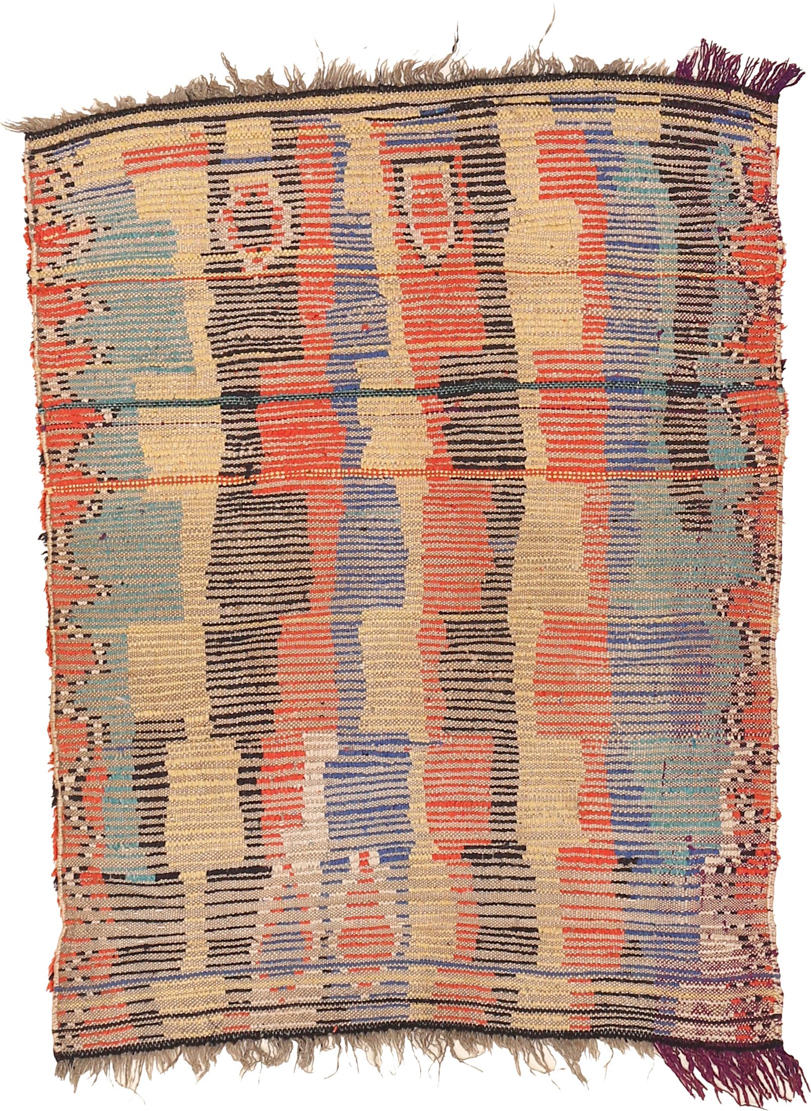 Also belonging to the 'colored Azilal' subgroup is this sweet miniature rug, with its pattern of crenellated totemic devices, in which the weaver fully displays her ability to work on the reciprocals. The color juxtaposition is such that our eye