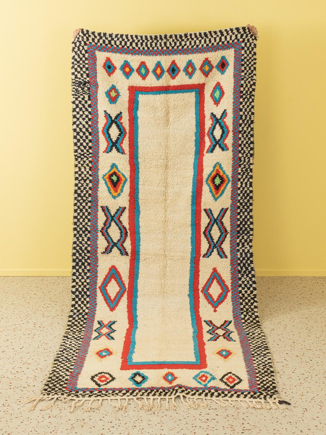 This Vintage Azilal is a 100 % wool rug – soft and comfortable underfoot. Our Berber rugs are handmade, one knot at a time. Each of our Berber rugs is a long-lasting one-of-a-kind piece, created in a sustainable manner with local wool.

Quality