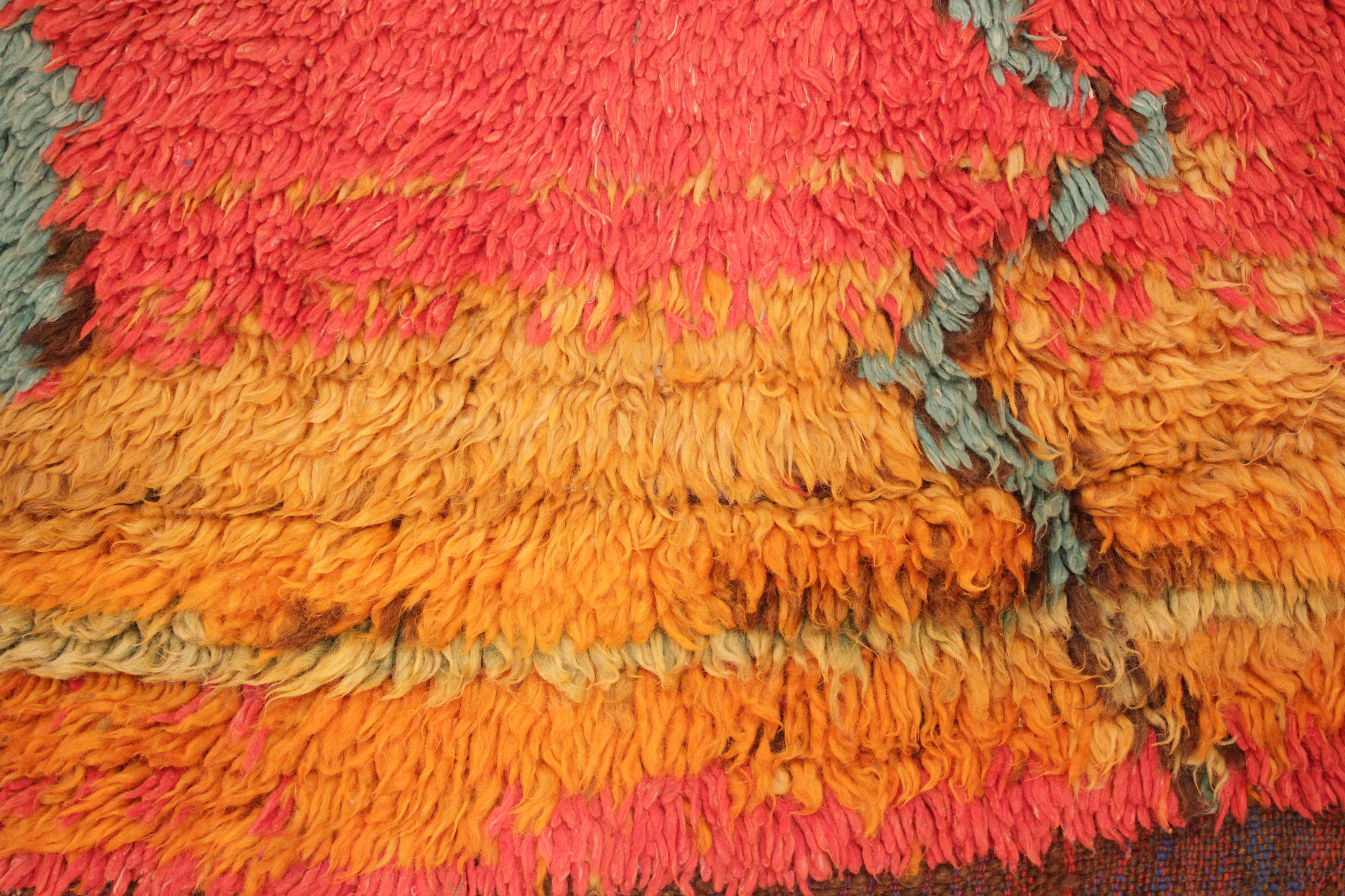 Tribal Vintage Azilal Moroccan Berber Rug with a Green Monolith on an Orange Background For Sale