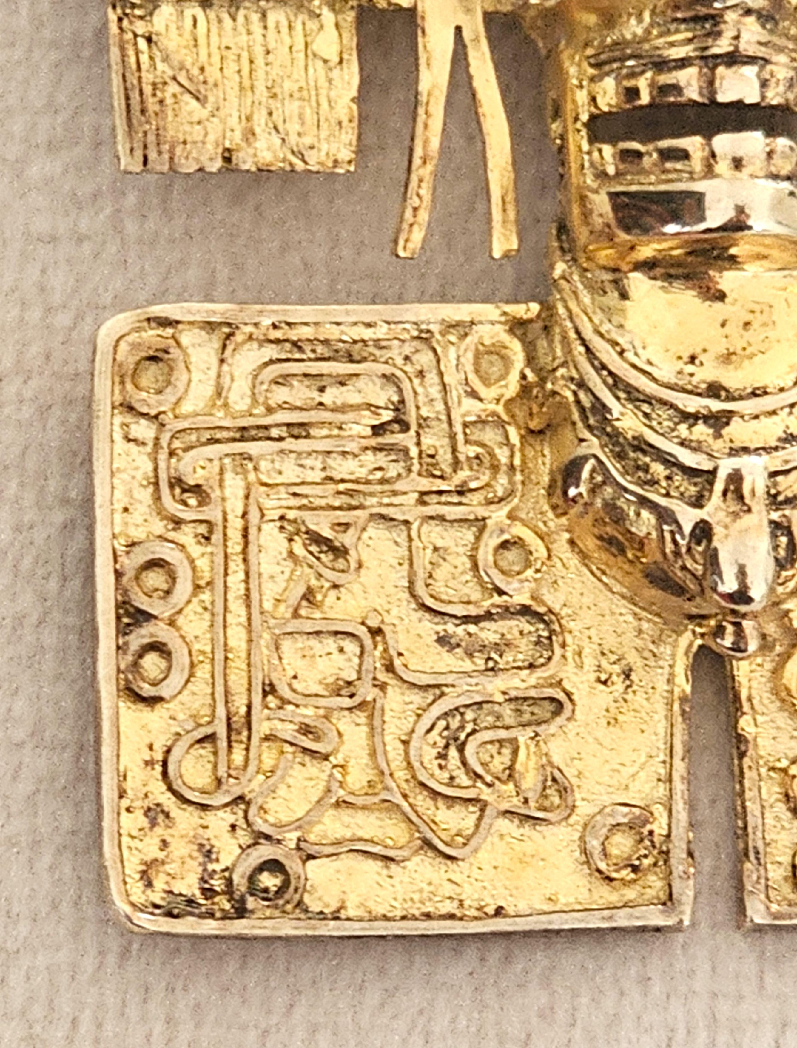 Rare Vintage Aztec-Inspired Sterling Silver Brooch/Pendant.
A dual-function piece: can be worn as a brooch (pin) or as a pendant on a chain.
Inspired by Aztec art. Crafted in Mexico, a country renowned for silver artistry, especially in places like