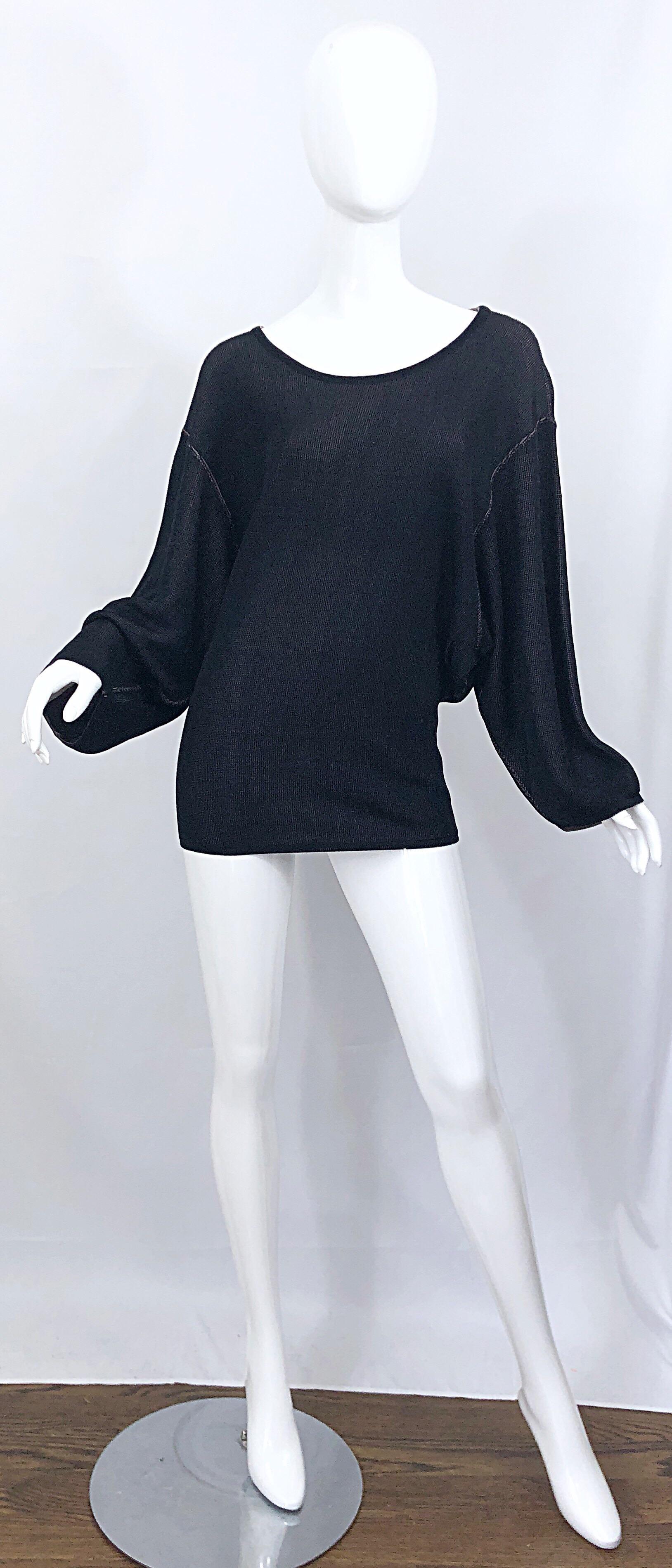 Sexy vintage 1980s AZZEDINE ALAIA black and nude viscose micro mini sweater dress / tunic! Features the most luxurious soft viscose rayon that drapes the body so beautifully. Dolman sleeves will accomodate an array of bust sizes, and skirt is meant
