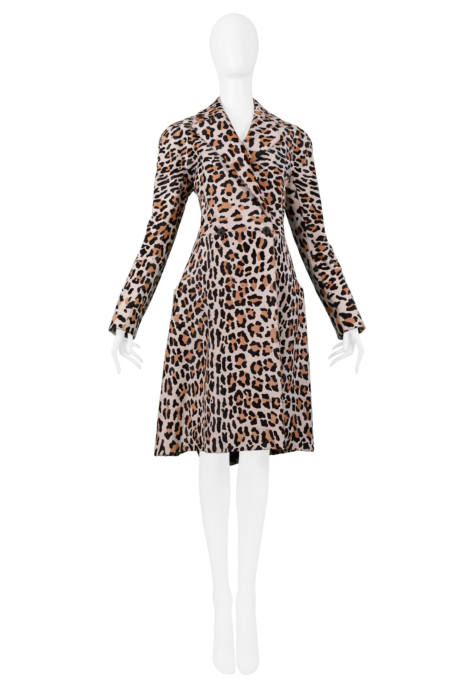 A stunning vintage pony hair Azzedine Alaia leopard print coat with black double button closure, a vented back, side pockets, and fully lined. 

Excellent original condition with no 