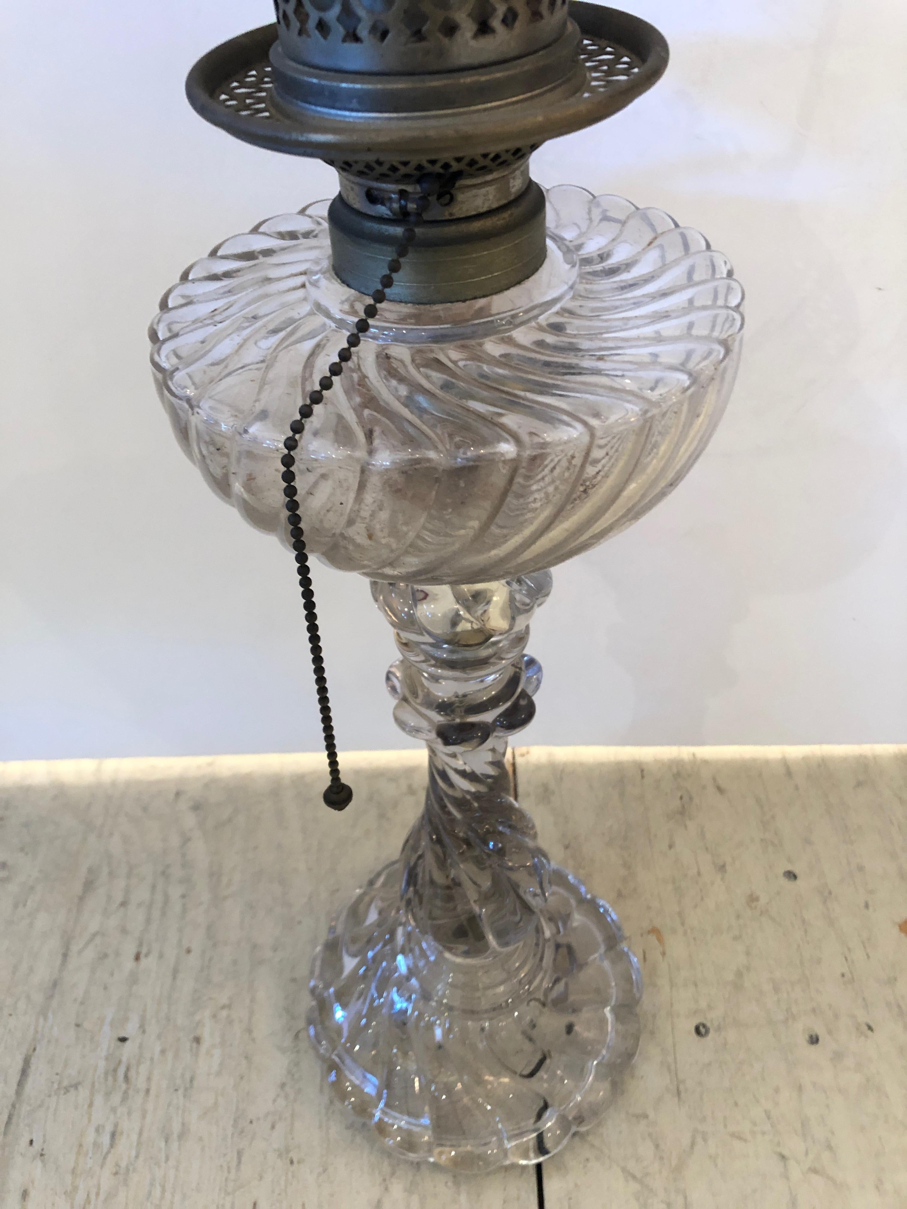 A vintage original crystal oil lamp attributed to Baccarat, fully electrified.
(If you need a pair, a matching lamp is also available with a repaired oil tank.)