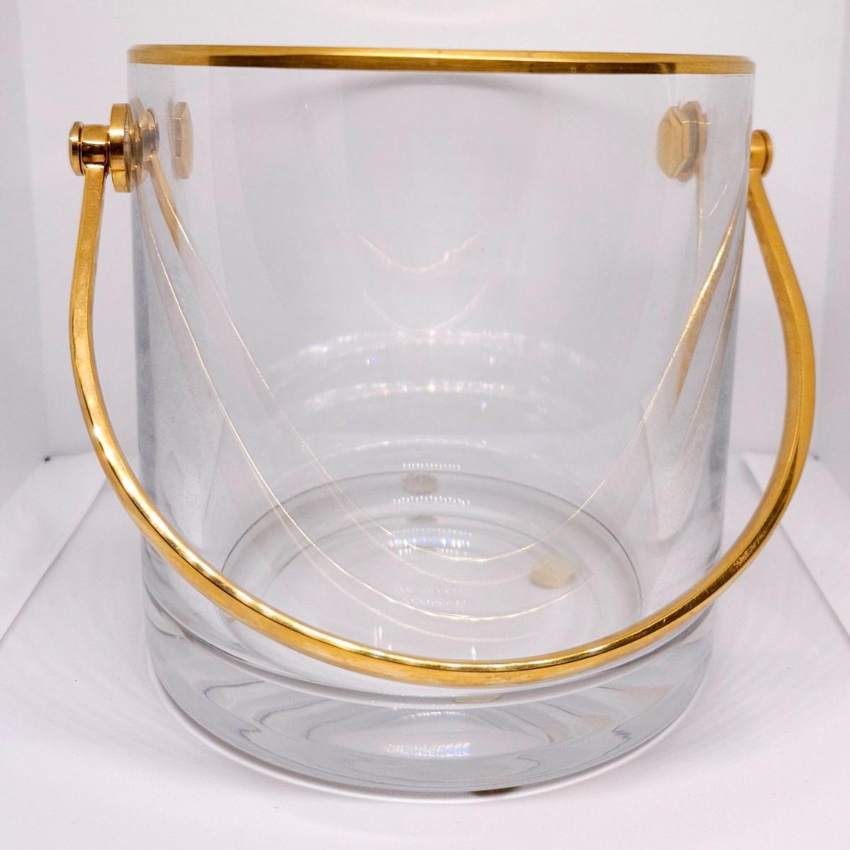 Vintage Baccarat France Crystal Ice Bucket with Gold Handle. It has 