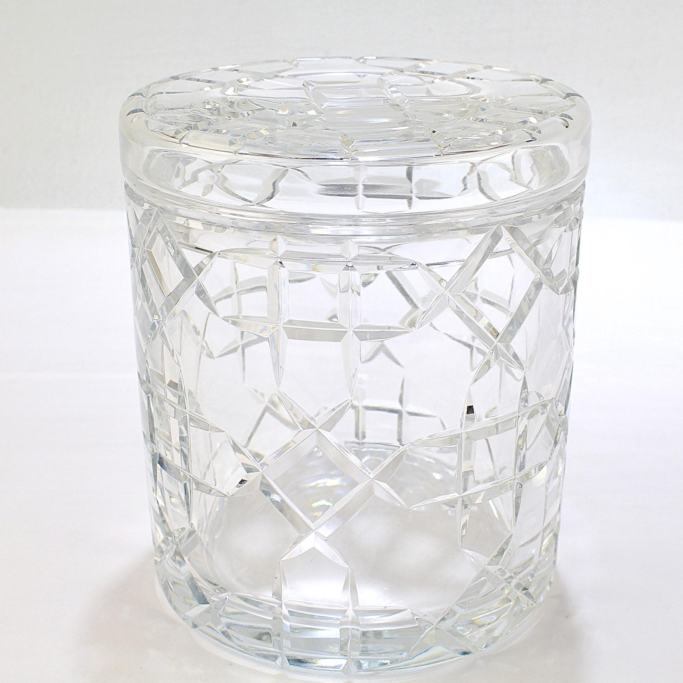 A fine cut glass biscuit barrel.

By Baccarat.

With a modern wheel-like decoration.

Simply a wonderful piece of Baccarat glass!

Date:
20th Century

Overall Condition:
It is in overall good, as-pictured, used estate condition with some
