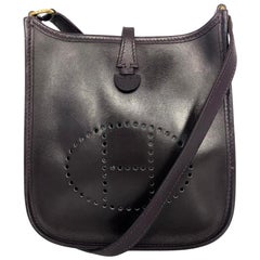 Vintage Bag  Hermès Evelyne TPM in Amarante colored leather