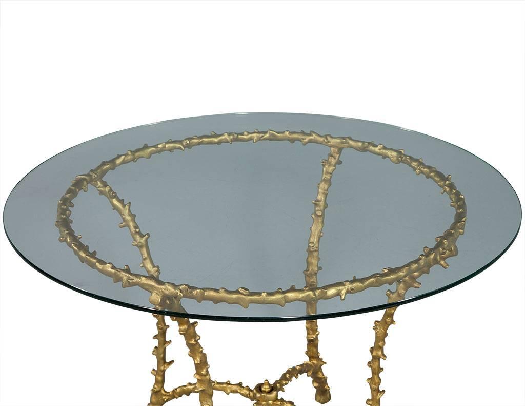 Vintage Bagues faux bamboo French gilt round brass table. Since its establishment in 1860, the Maison Baguès has been an emblem of French sophistication in luxury design. Each piece made is hand assembled using traditional techniques, in order to