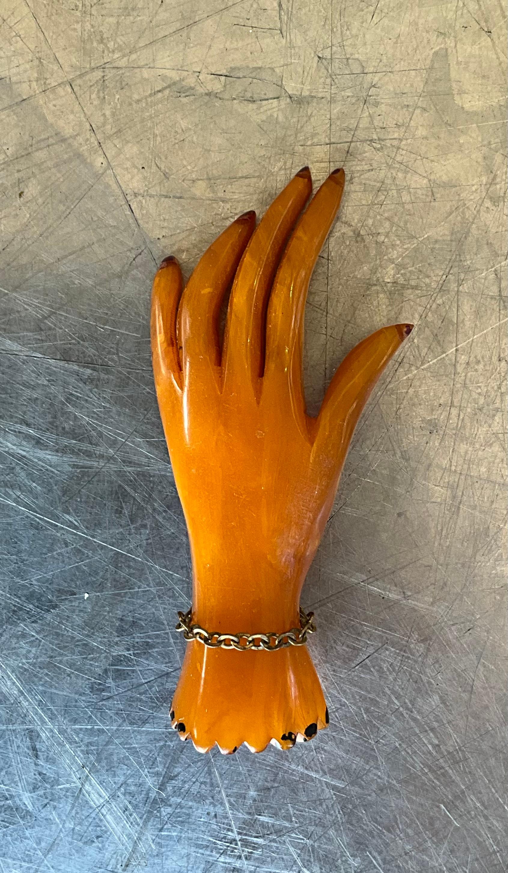 Women's or Men's Vintage Bakelite Butterscotch Carved Hand Brooch For Sale