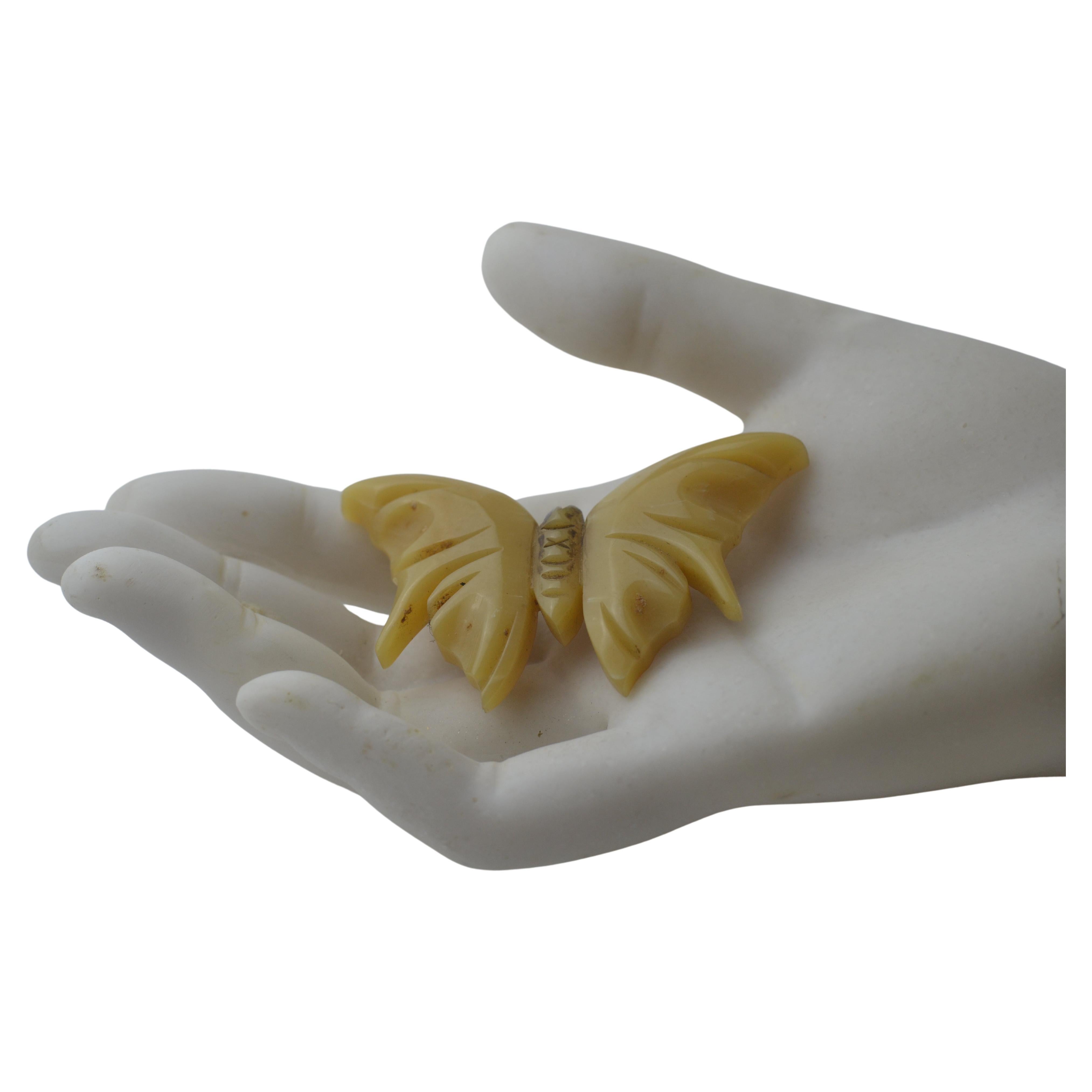 Vintage bakelite carved butterscotch butterfly brooch bought in Paris circa 1940 For Sale