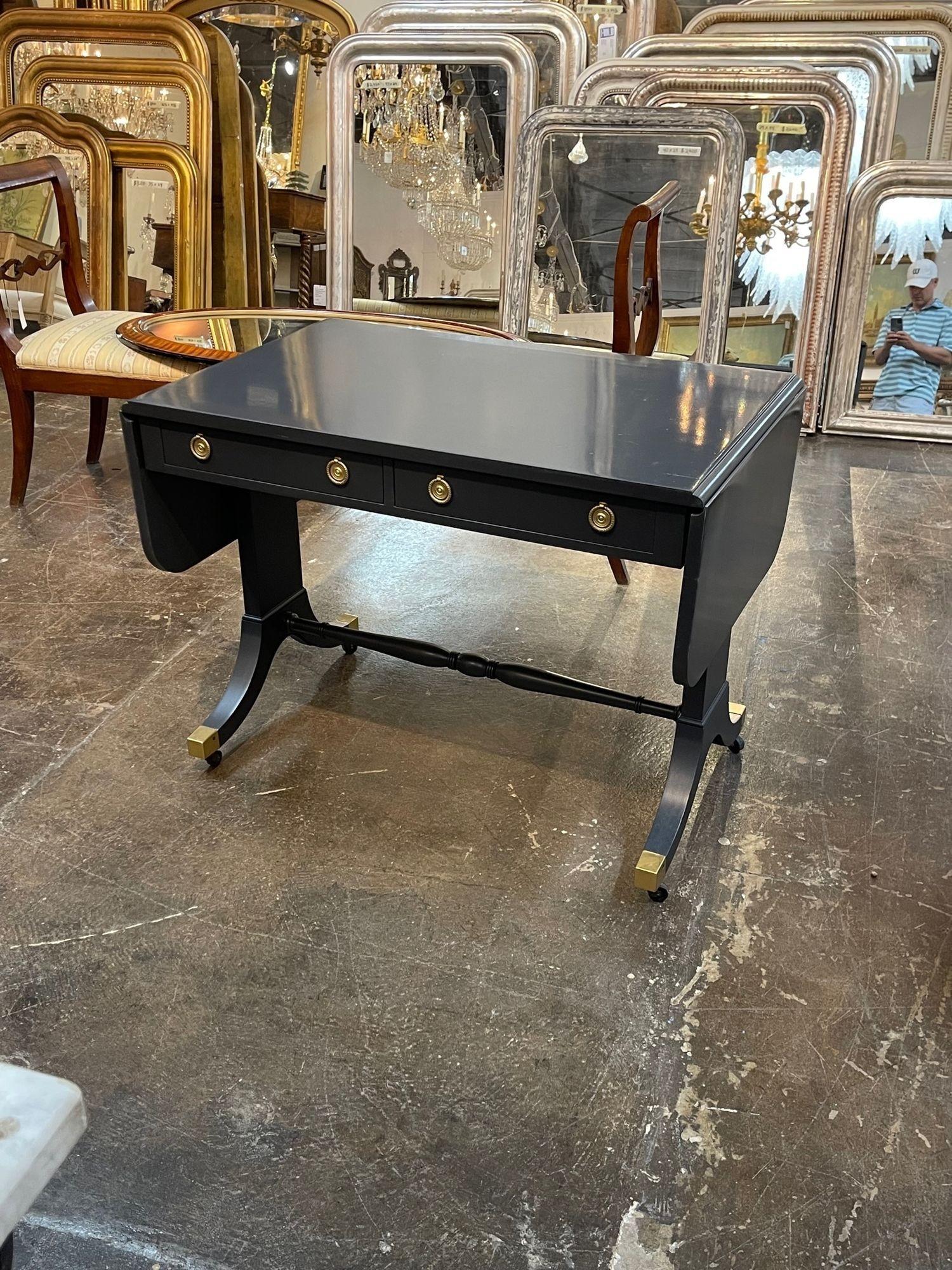Gorgeous vintage English Regency drop leaf side table. Featuring a beautiful grey lacquered finish. Such an elegant piece!